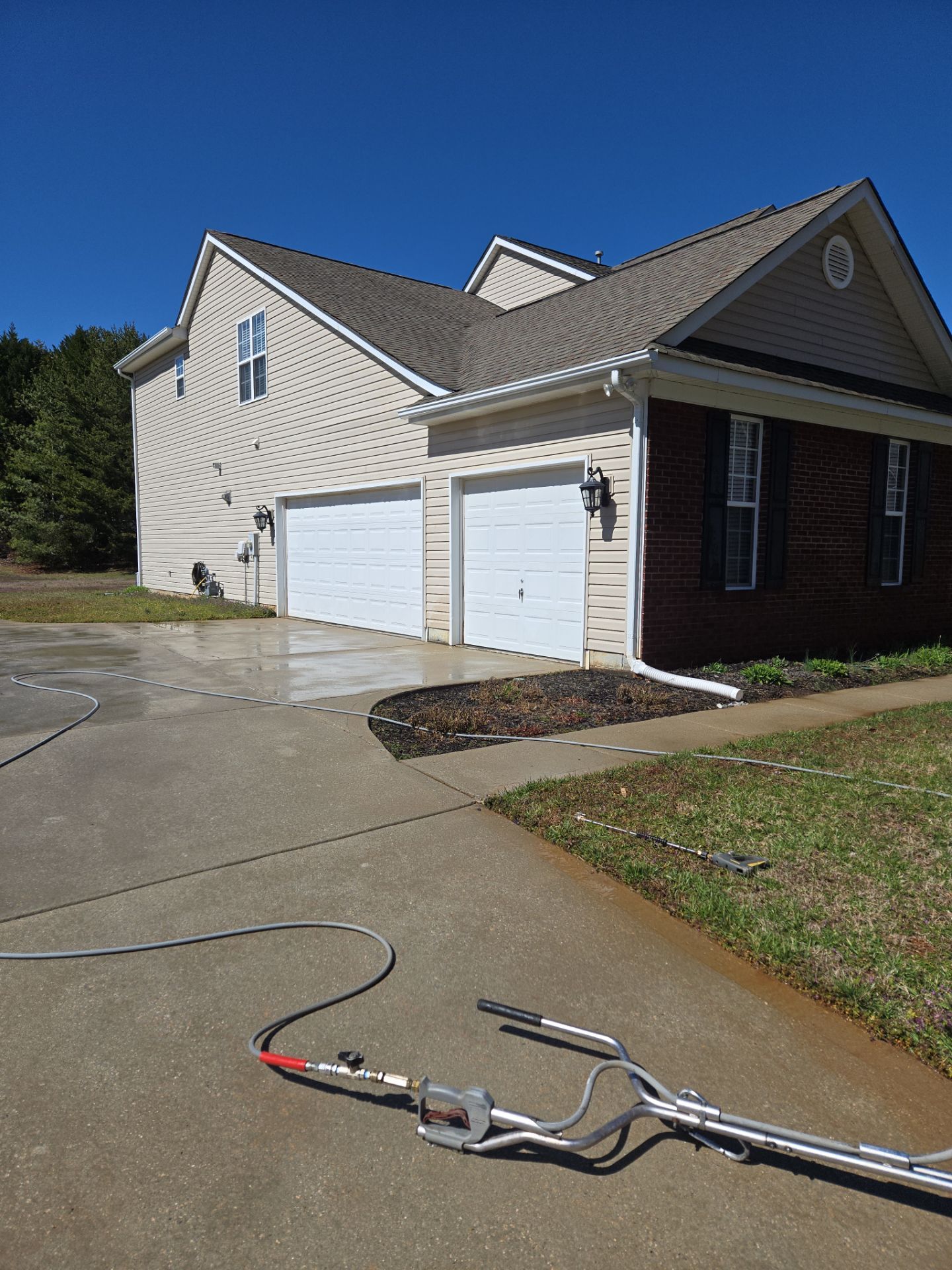 House Wash using cleaner by Power Wash Masters LLC