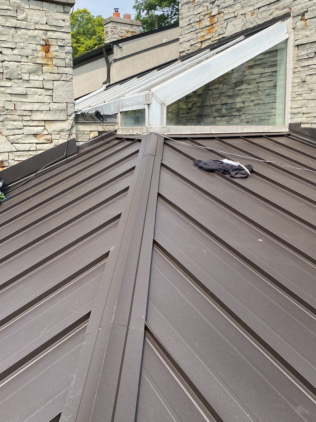 Roof Replacement using 16" Standing Seam Panels by Jay Carter Roofing & Sheet Metal