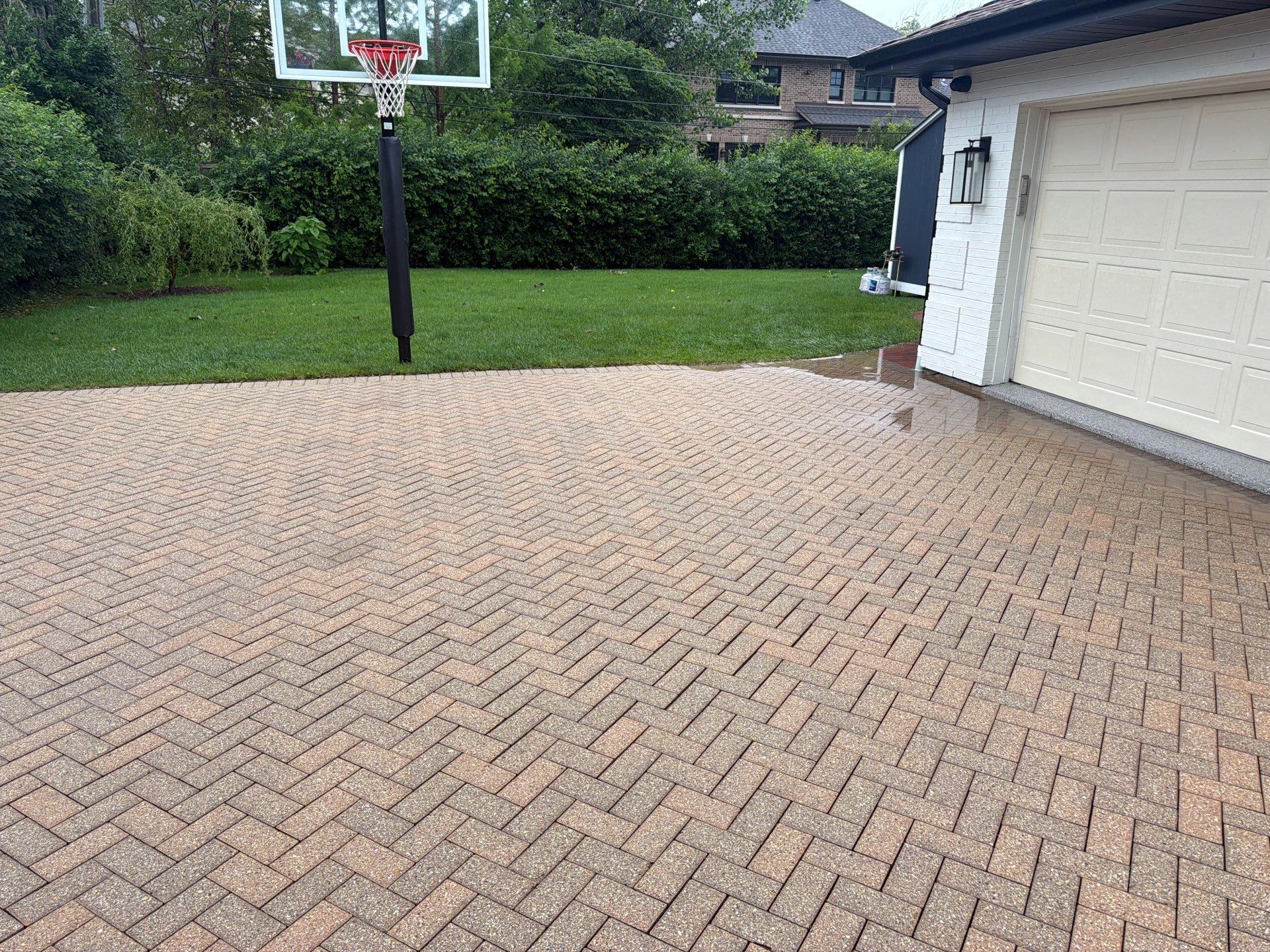 Brick paver repair, cleaning and sealing by Northern Power Washing LLC.