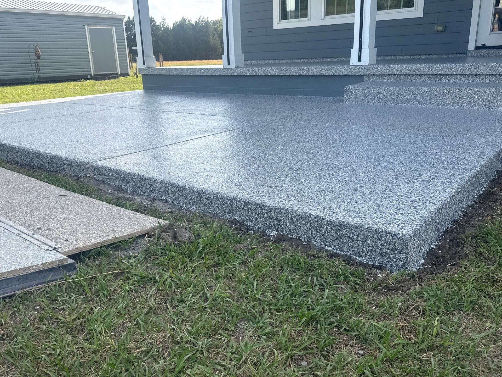 Back Patio in Slate Stone by Cross Creek Concrete Coatings