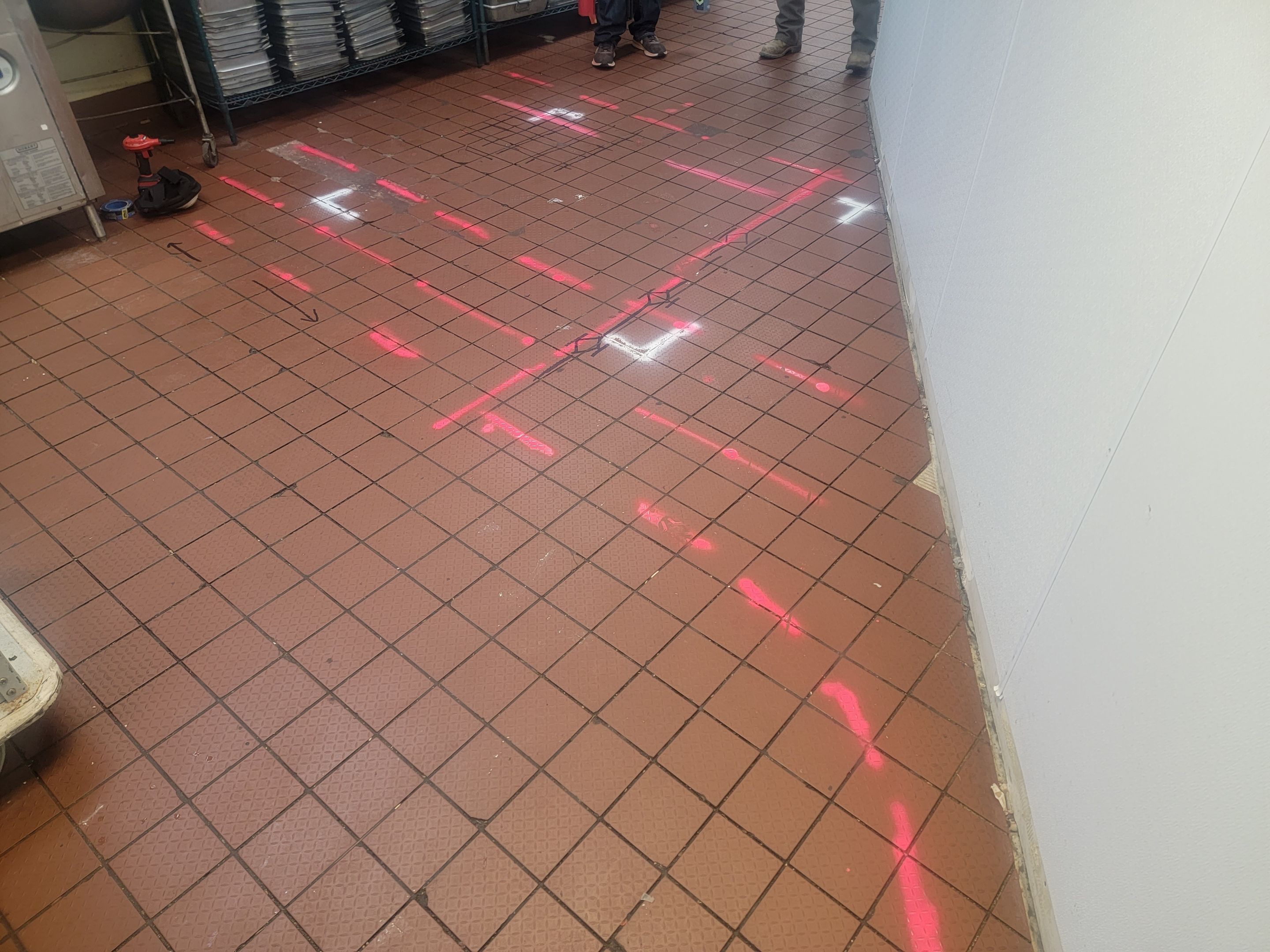 Marking Electrical Ducts within the concrete before saw cutting by Alsip Locating Service, LLC