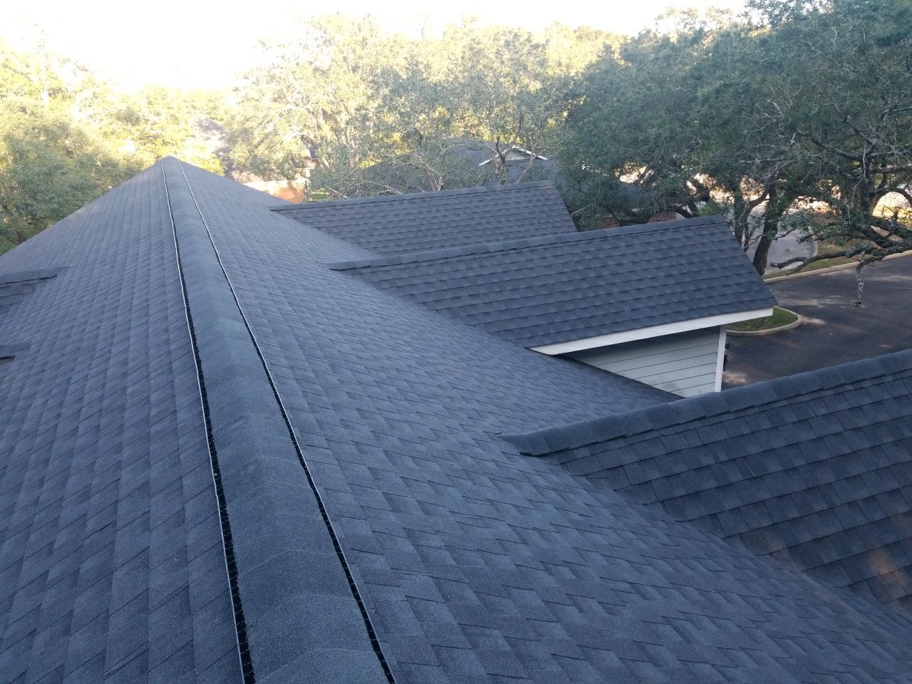 Residential Roofing Installation using Roof Replacement by American Roofing & Construction LLC