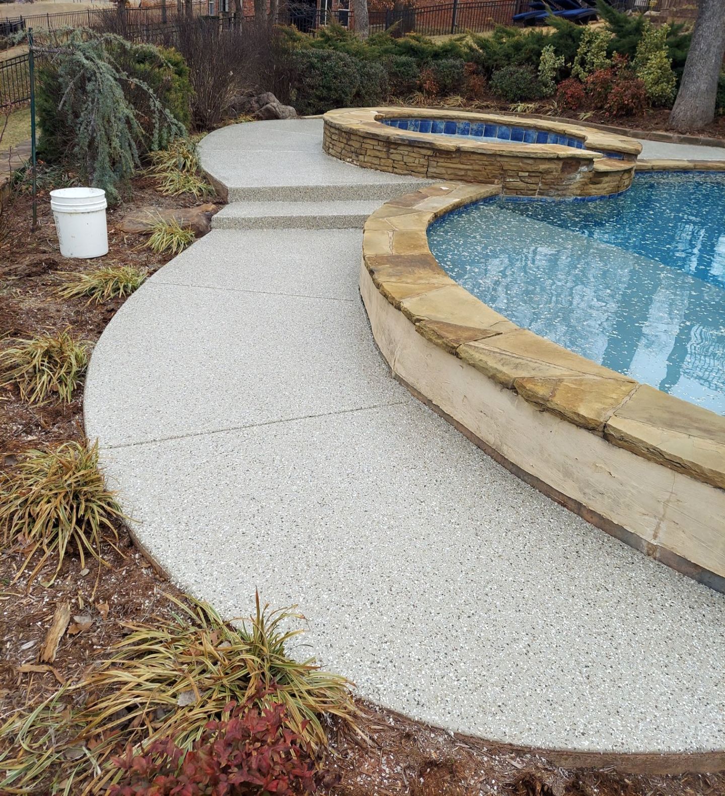 Pool Deck Install with Pebble Beach by Copperhead Coatings