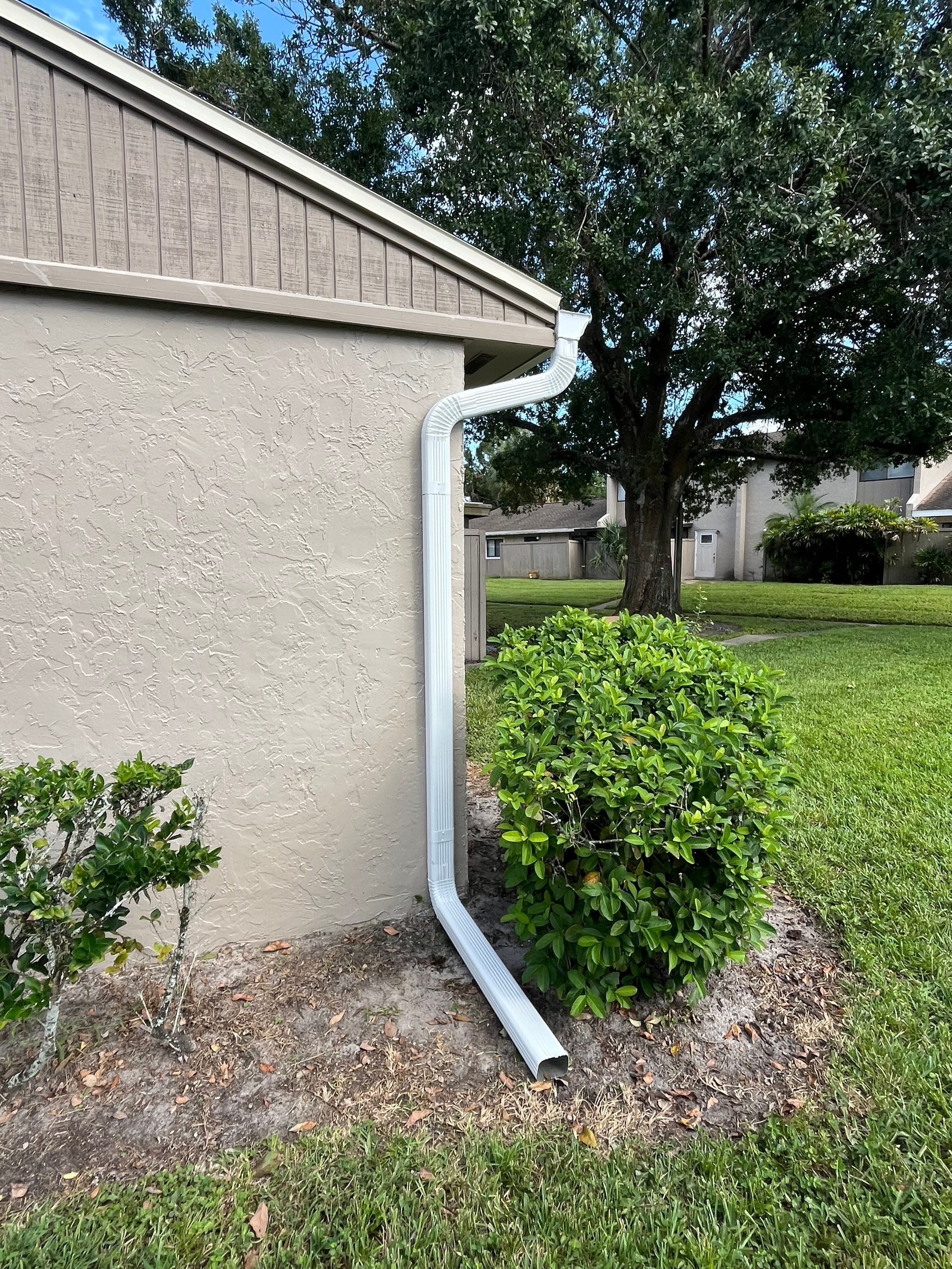 Professional Downspout Installation in Tampa, FL by Gutter Professor by Gutter Professors