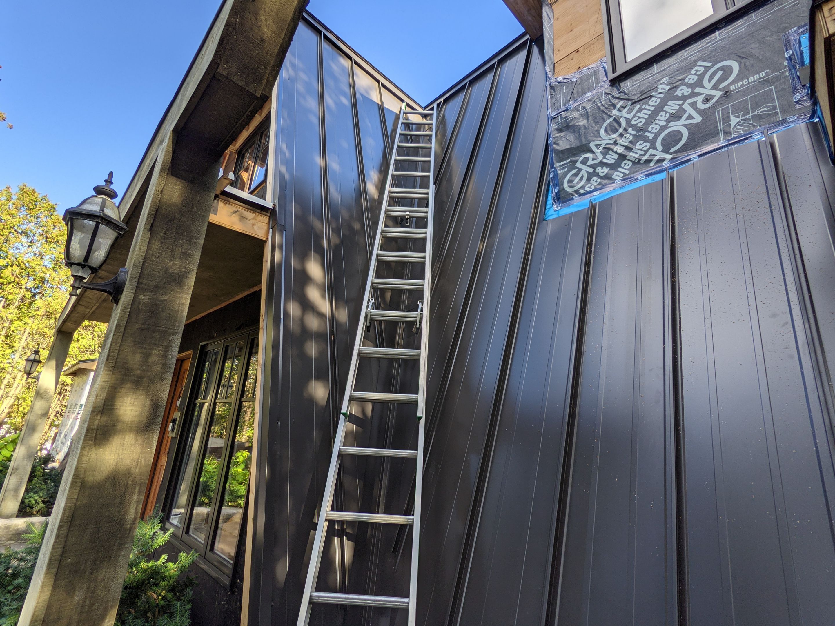 Residential Roofing Installation using 16" Standing Seam Panels by Jay Carter Roofing & Sheet Metal