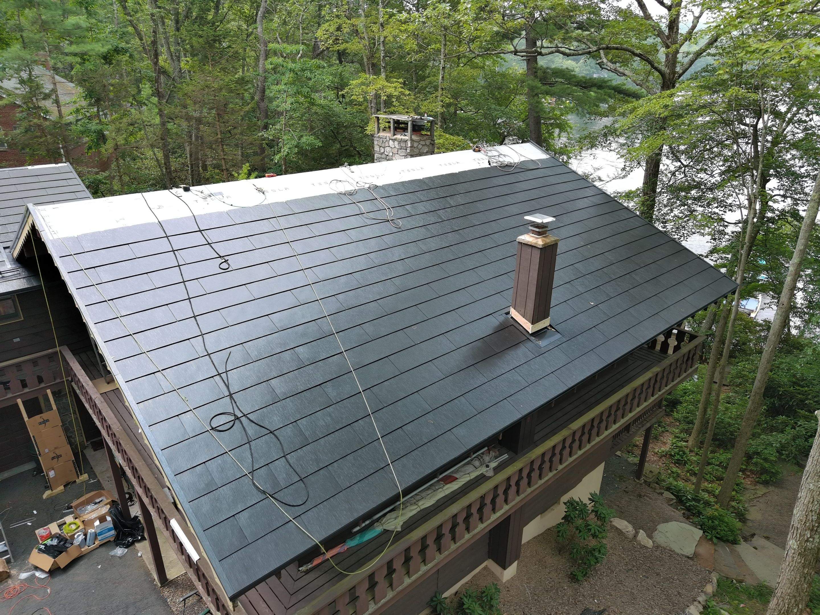 Stunning Tesla Solar Roof Cabin in the Woods by American Home Contractors