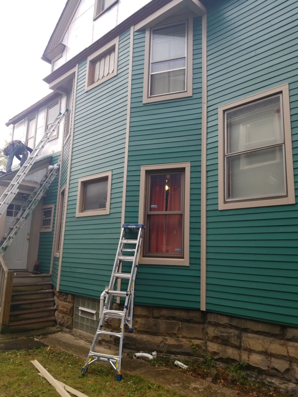 James Hardie Siding on Antique Home by Absolute Roofing and Construction