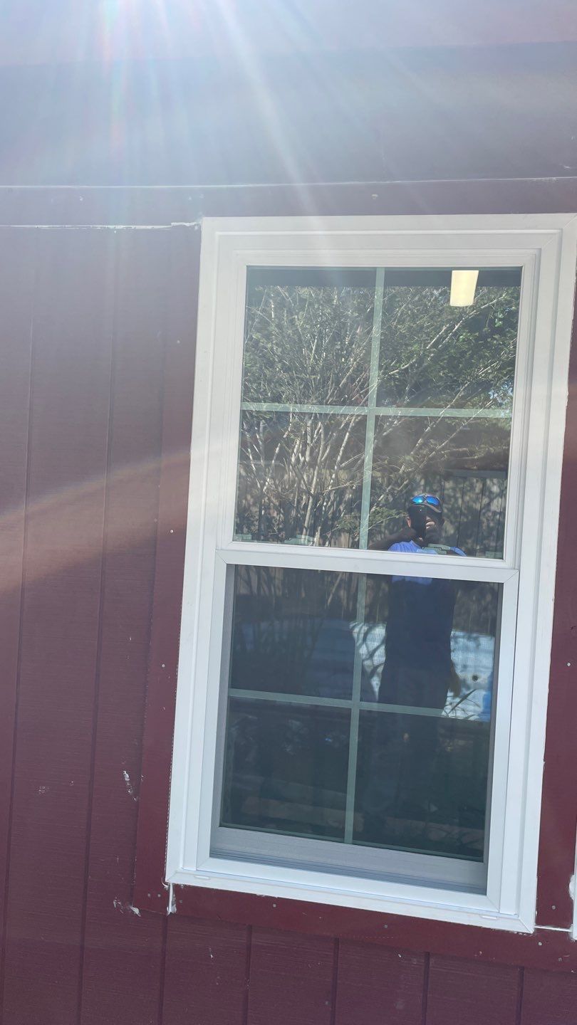 Black and white and red all over by Bayfront Roofing and Construction