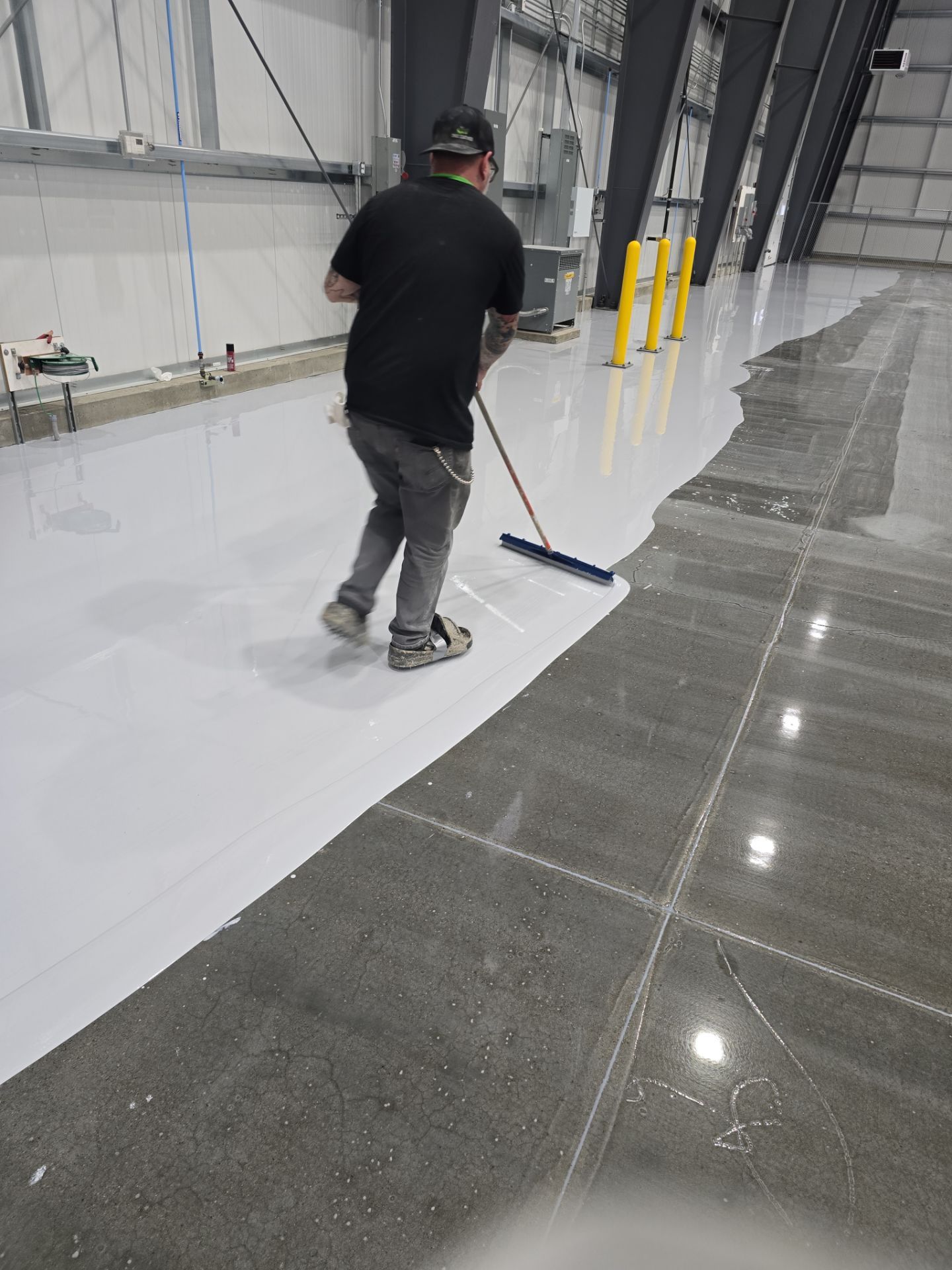 Airplane Hanger using Light Grey Commercial Penntek Epoxy by Croc Coatings, LLC