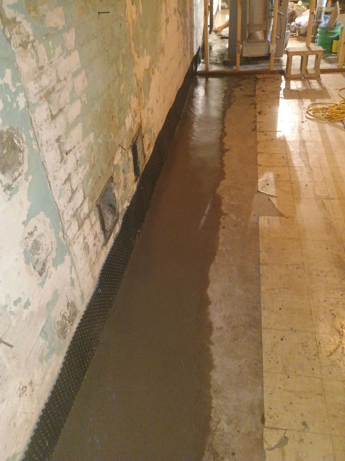 Interior Drain Tile for a South Minneapolis Basement by Waterproofing Northeast