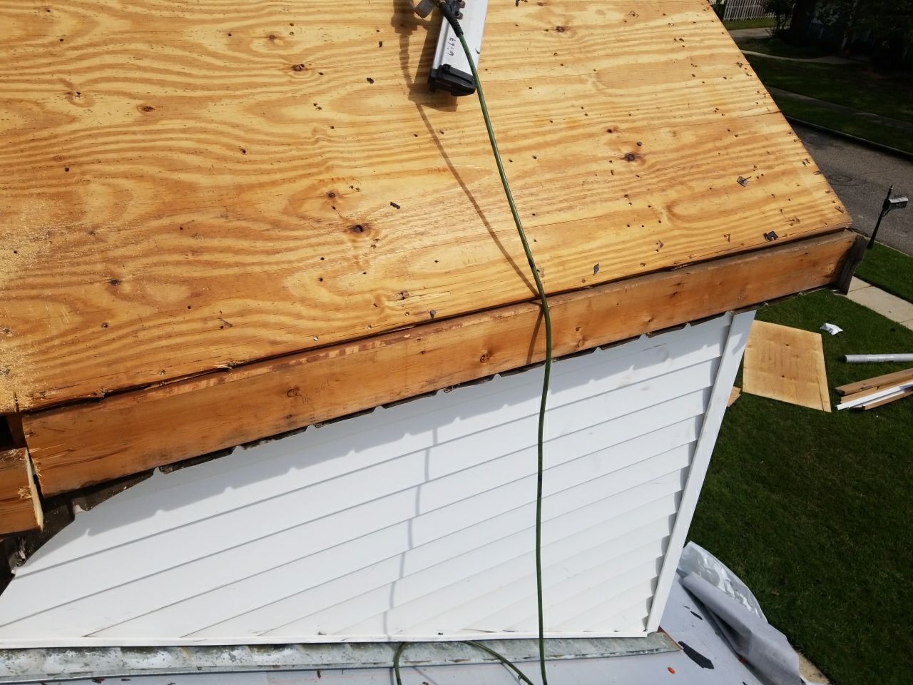 Residential Roofing Installation using Roof Replacement by American Roofing & Construction LLC