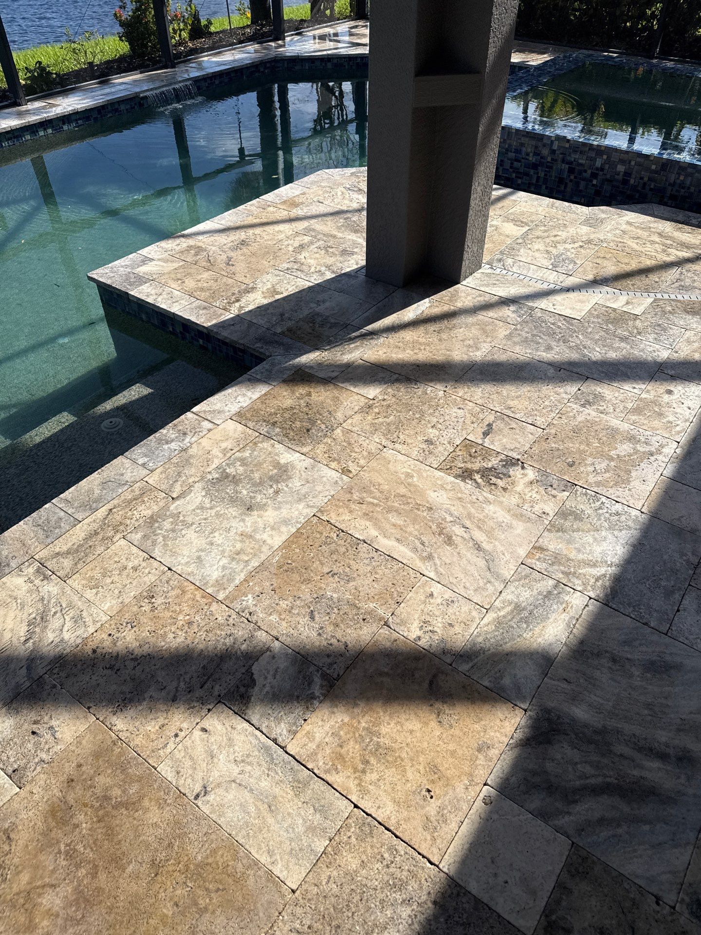 Travertine Pool Deck and Screen Enclosure Cleaning in Ellenton, FL | Oakleaf Hammock Community by Sunshine AquaWash