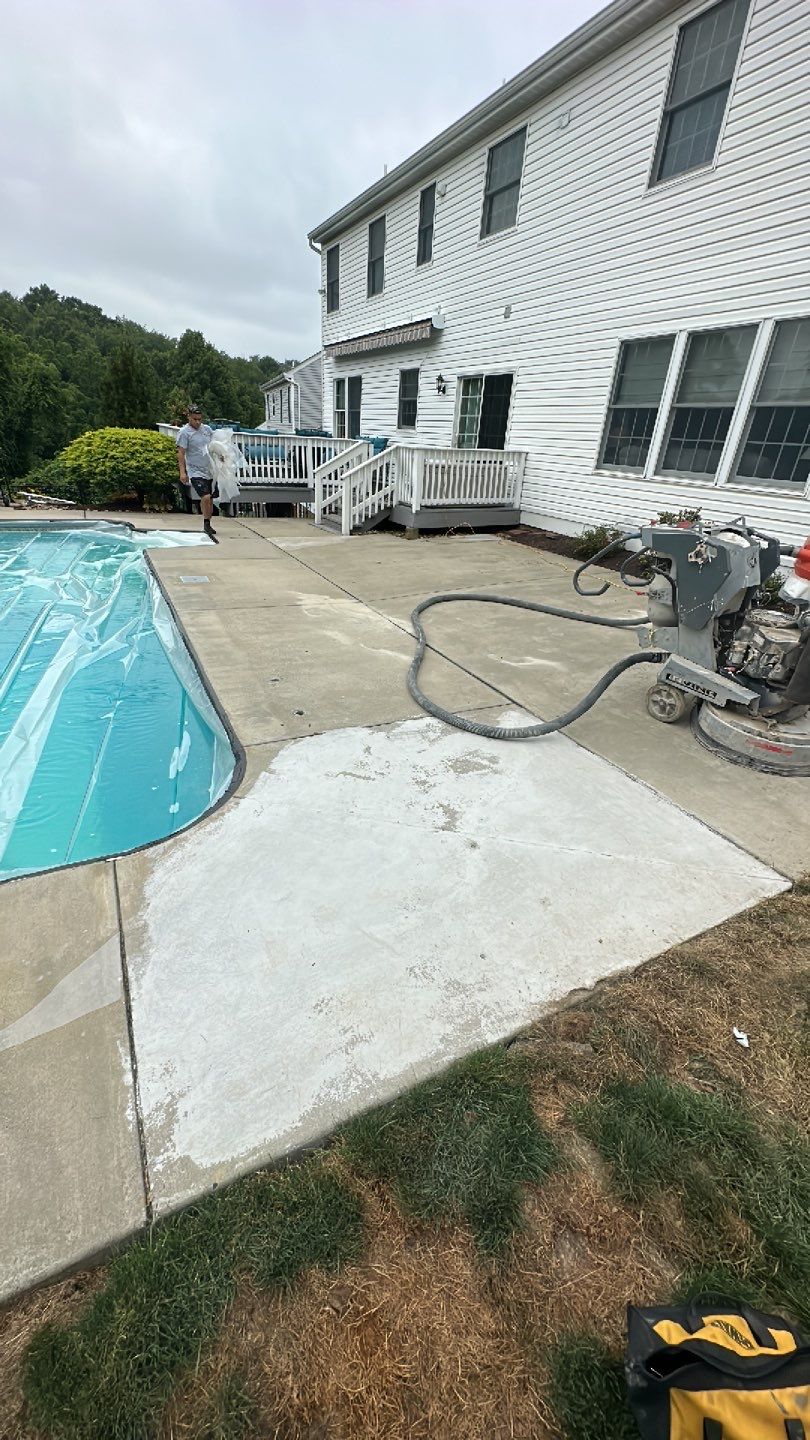 Pool Deck + Driveway + Garage Project in Venetia by Floors in a Day, Inc