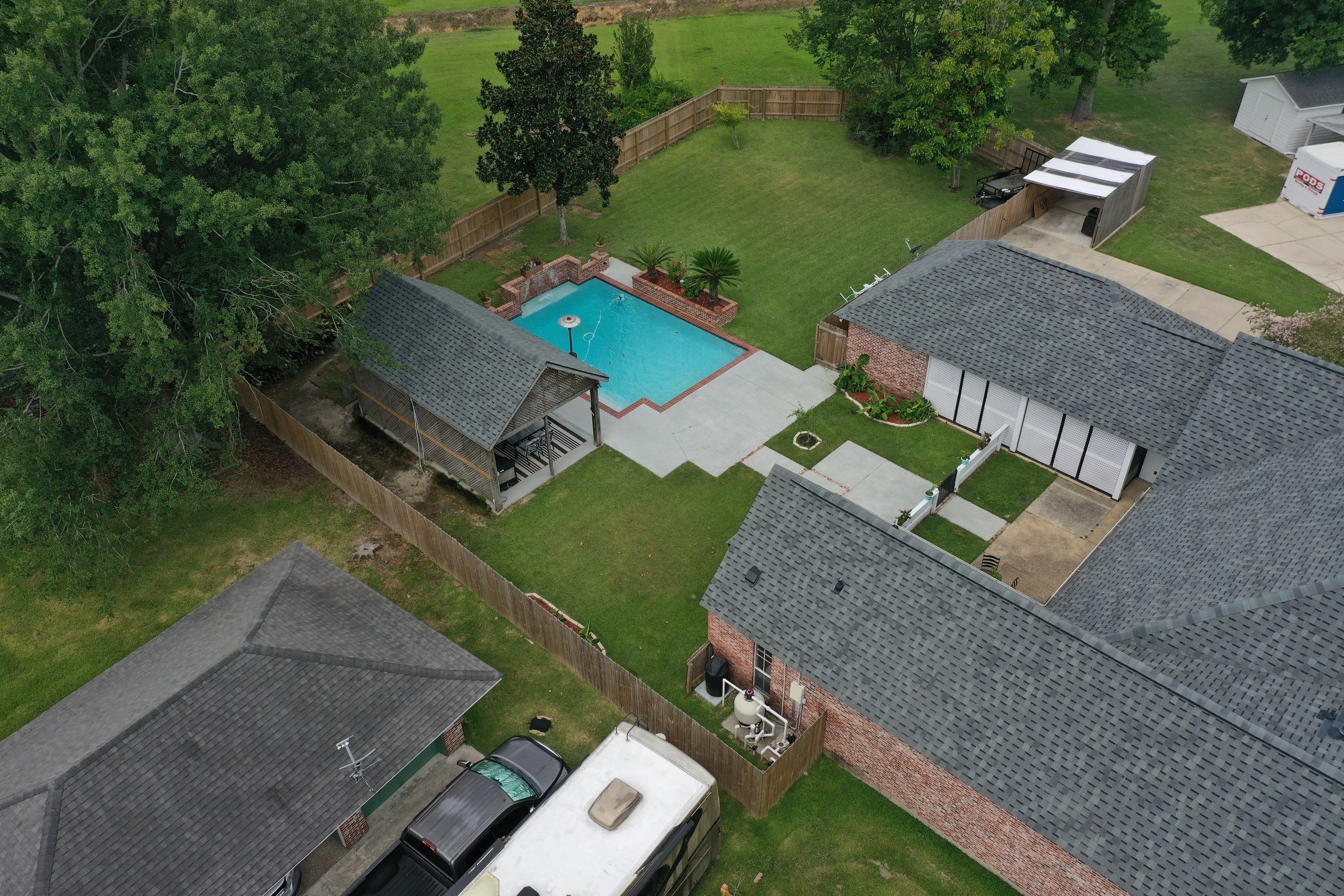 Residential Roofing Installation using Atlas Pinnacle Pristine Hearthstone by Top Team Construction