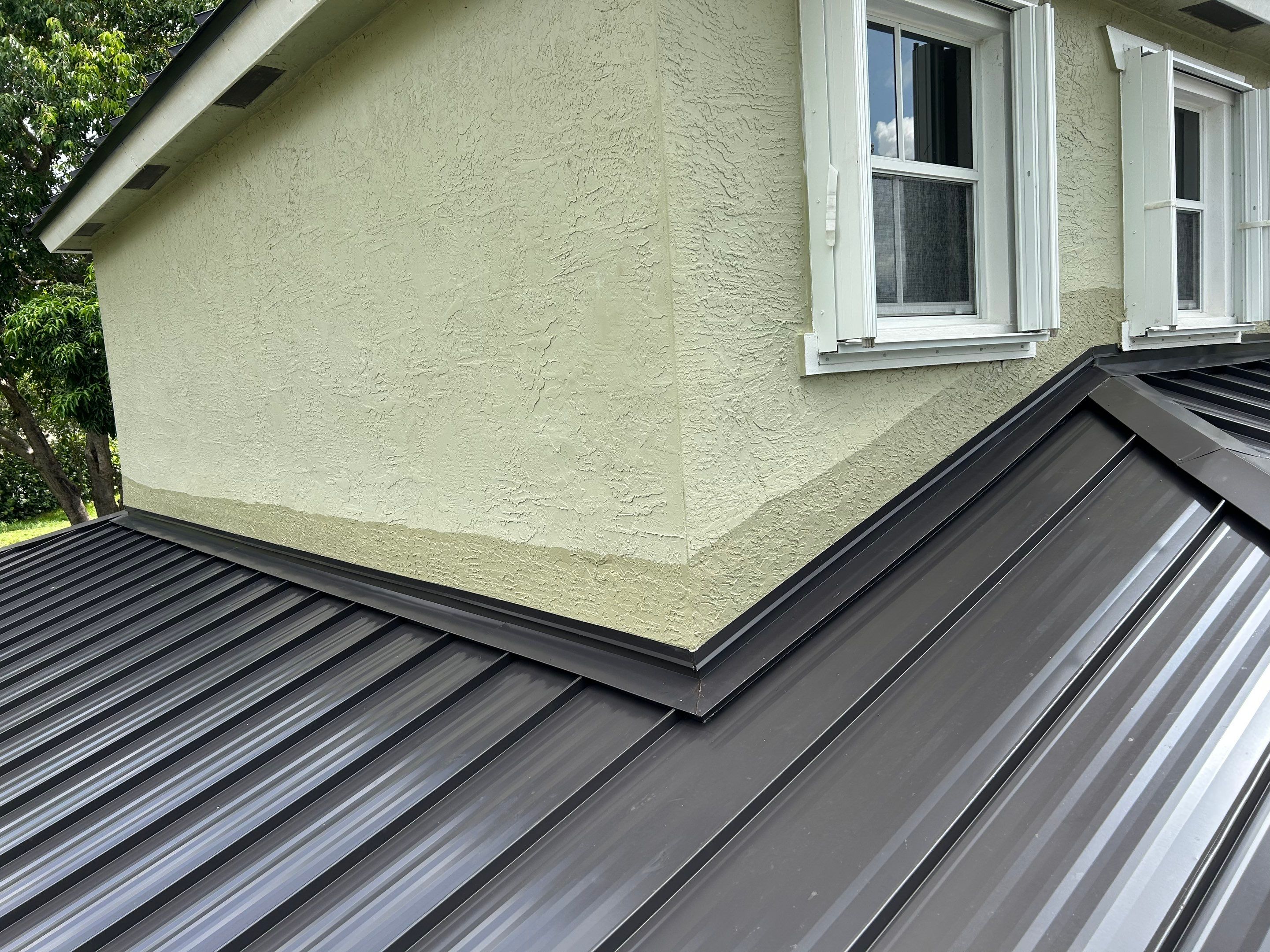 24ga 1.5" Mechanical Seam Dark Bronze by Total Roofing System The Metal Roof Experts