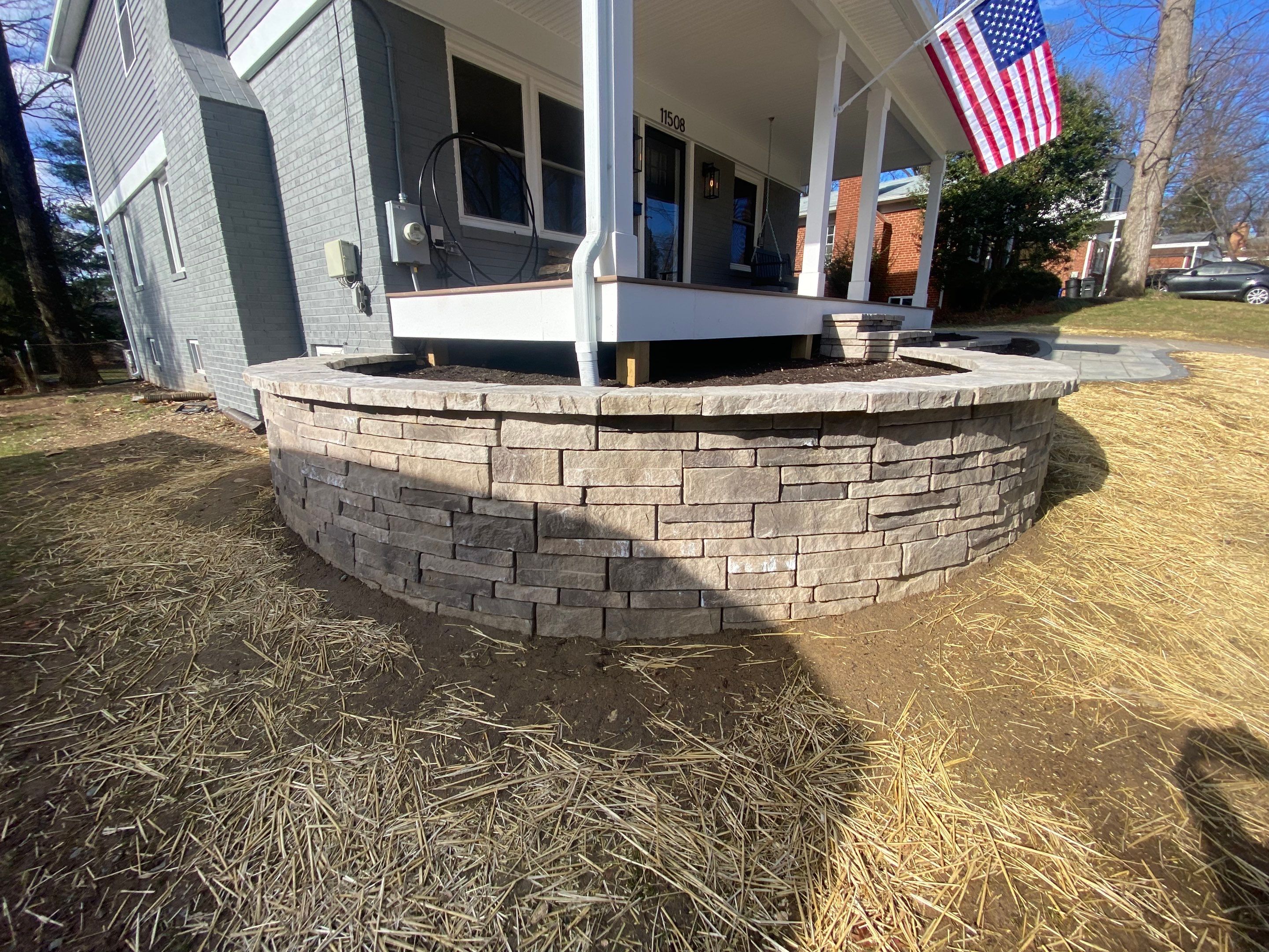 Retaining wall, walkway, small patio and landscape install by The Smet Companies, LLC