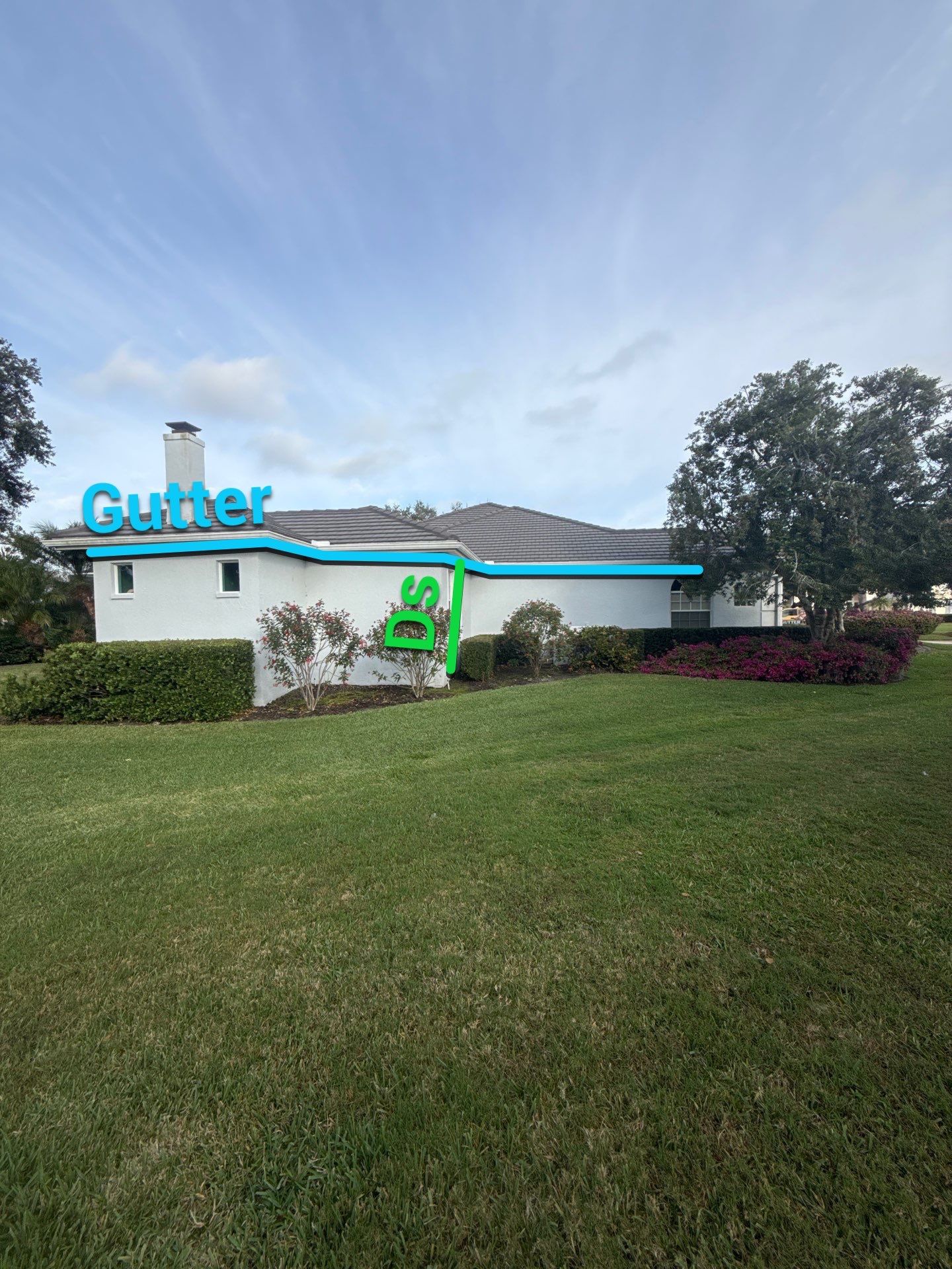 White Down Spouts using downspouts and White Seamless Gutters in Sarasota FL by Gutter Professors