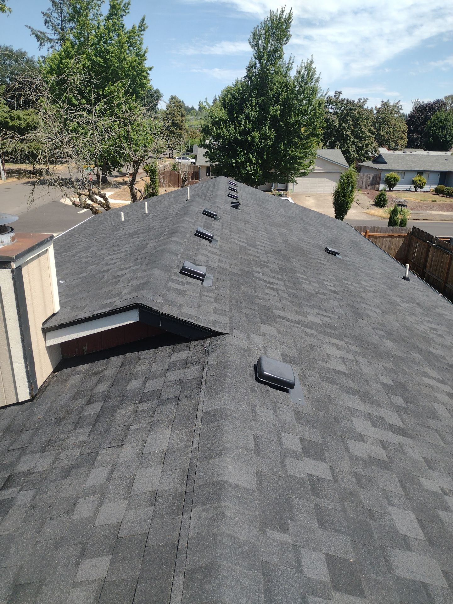 Residential Roofing Installation using IKO Dynasty (Color: Granite Black) by Orezona Building & Roofing Company, Inc.