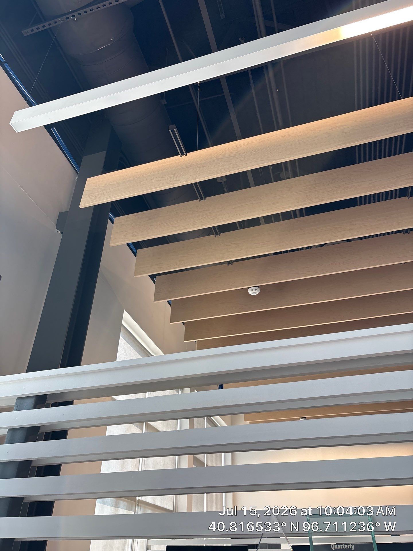 Modern Office Remodel with Wood Ceiling Baffles in Lincoln by CompanyCam Sales Demo