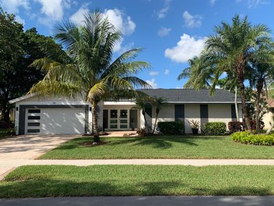 Front Entry Door, Sidelites & Garage Door Installation – Plantation, FL by The Door Doctor of South Florida, Inc.