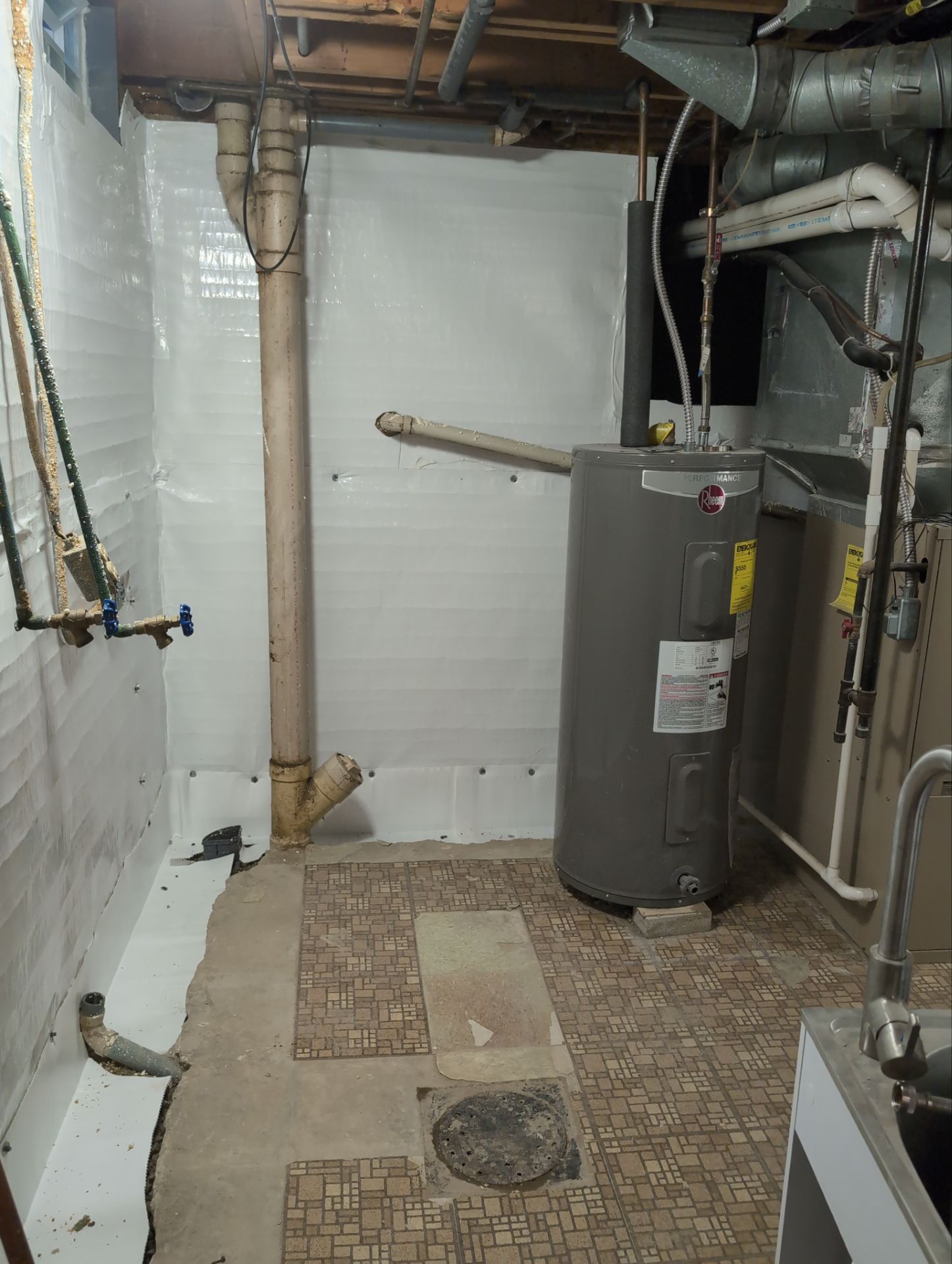 Interior Basement Waterproofing System and Egress Window Installation by Toledo Basement Repair 