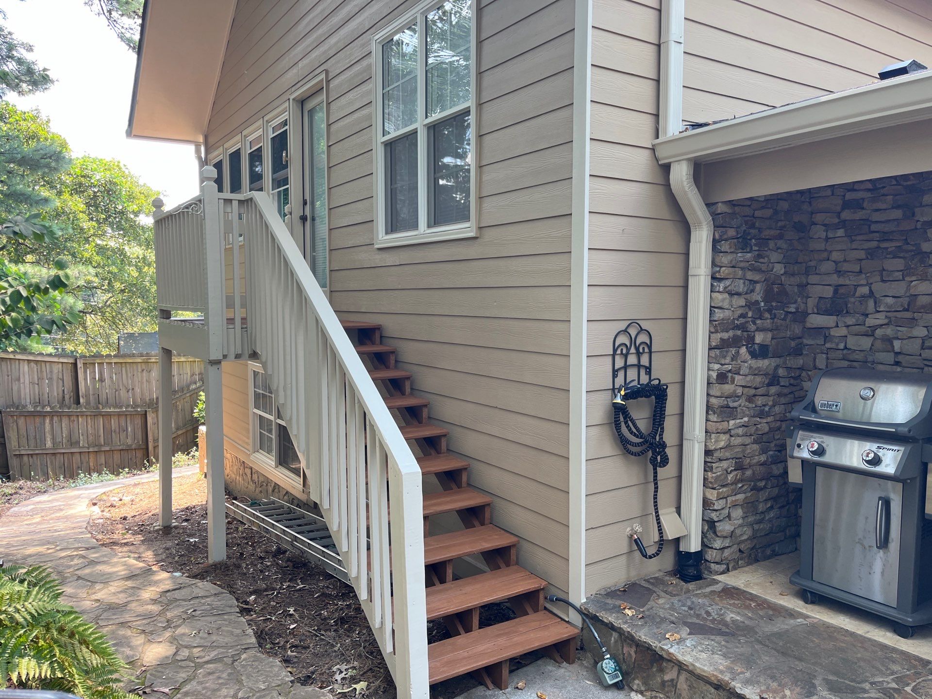 Rotted Wood Replacement, Deck Stain, and Exterior Paint Project in Kennesaw, GA by Nelson Exteriors 