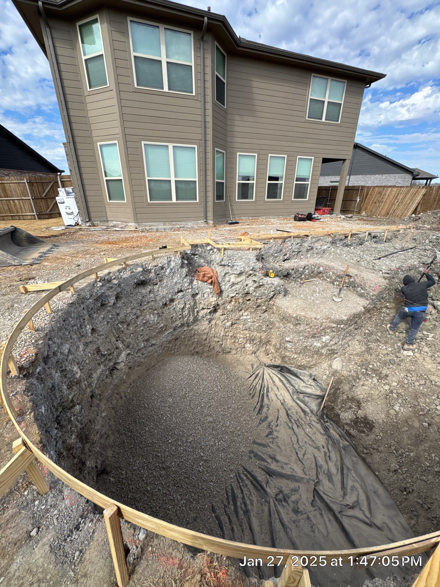 Geometric Pool with Spillover Spa and Dark Interior by Pinnacle Pools and Spas - DFW