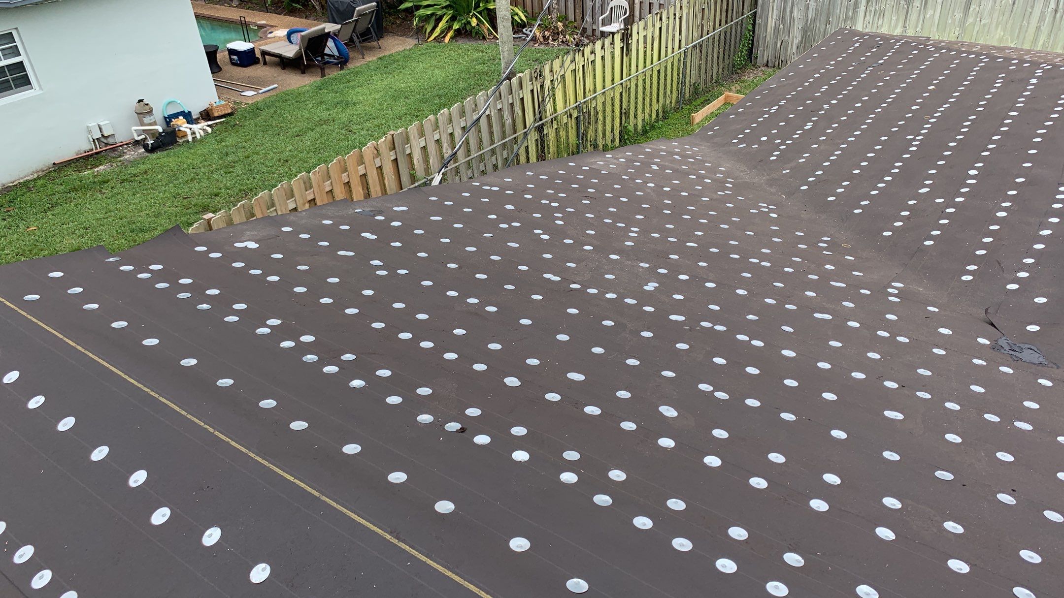Residential Roofing Installation using 1" Nail strip metal roof by BLUES BROTHERS ROOFING