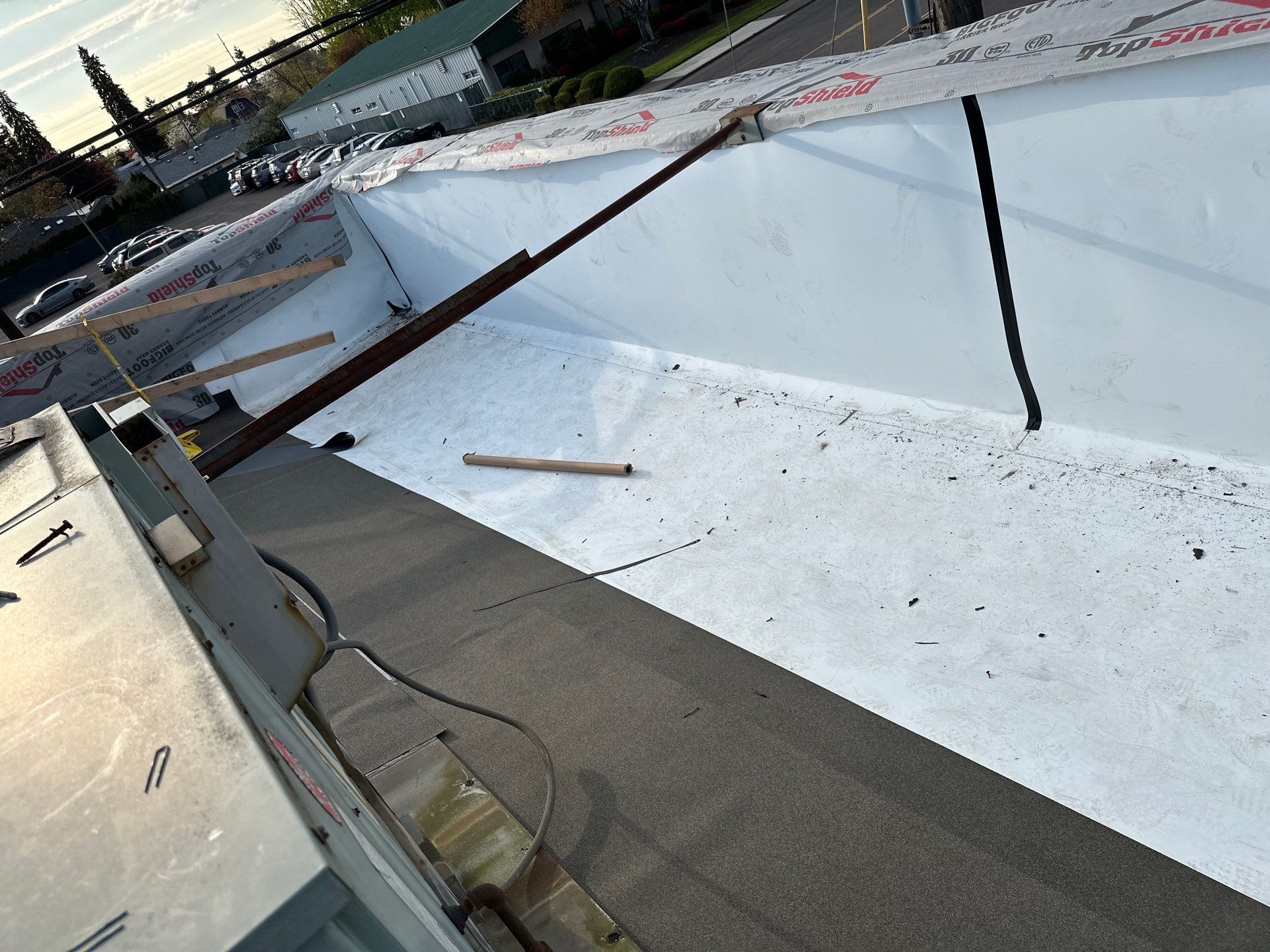 Commercial Roofing Installation using IKO Dynasty & GAF 60Mil TPO by Orezona Building & Roofing Company, Inc.