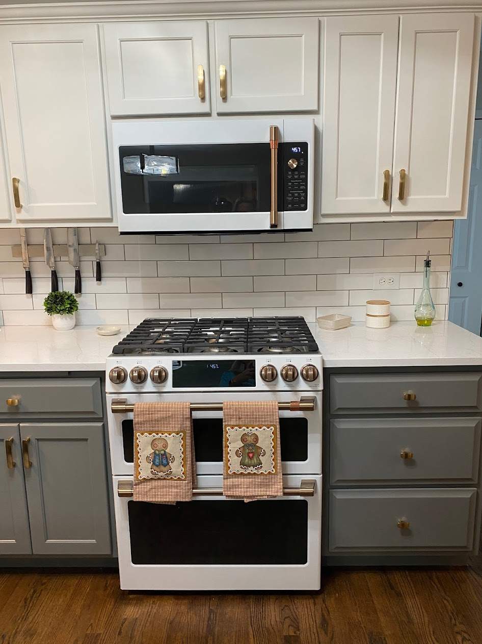 Two-Tone Kitchen Cabinet Painting & Staircase Painting in New Lenox by Powers Painting & Decorating, LLC