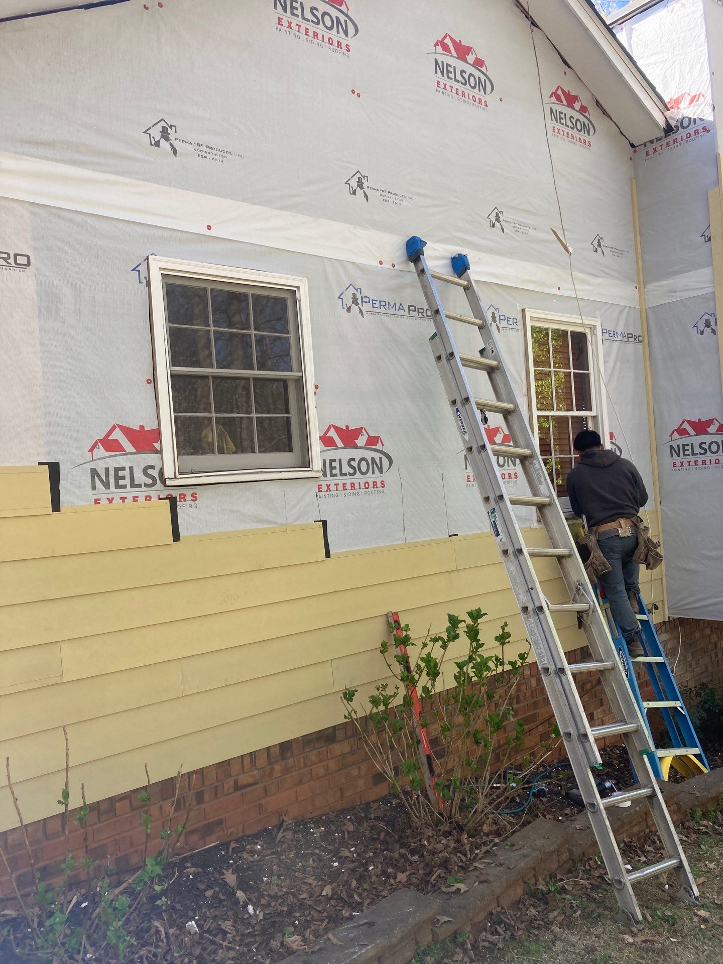 Window, Siding, & Rotten Wood Replacement with Exterior Painting in Woodstock, GA by Nelson Exteriors 