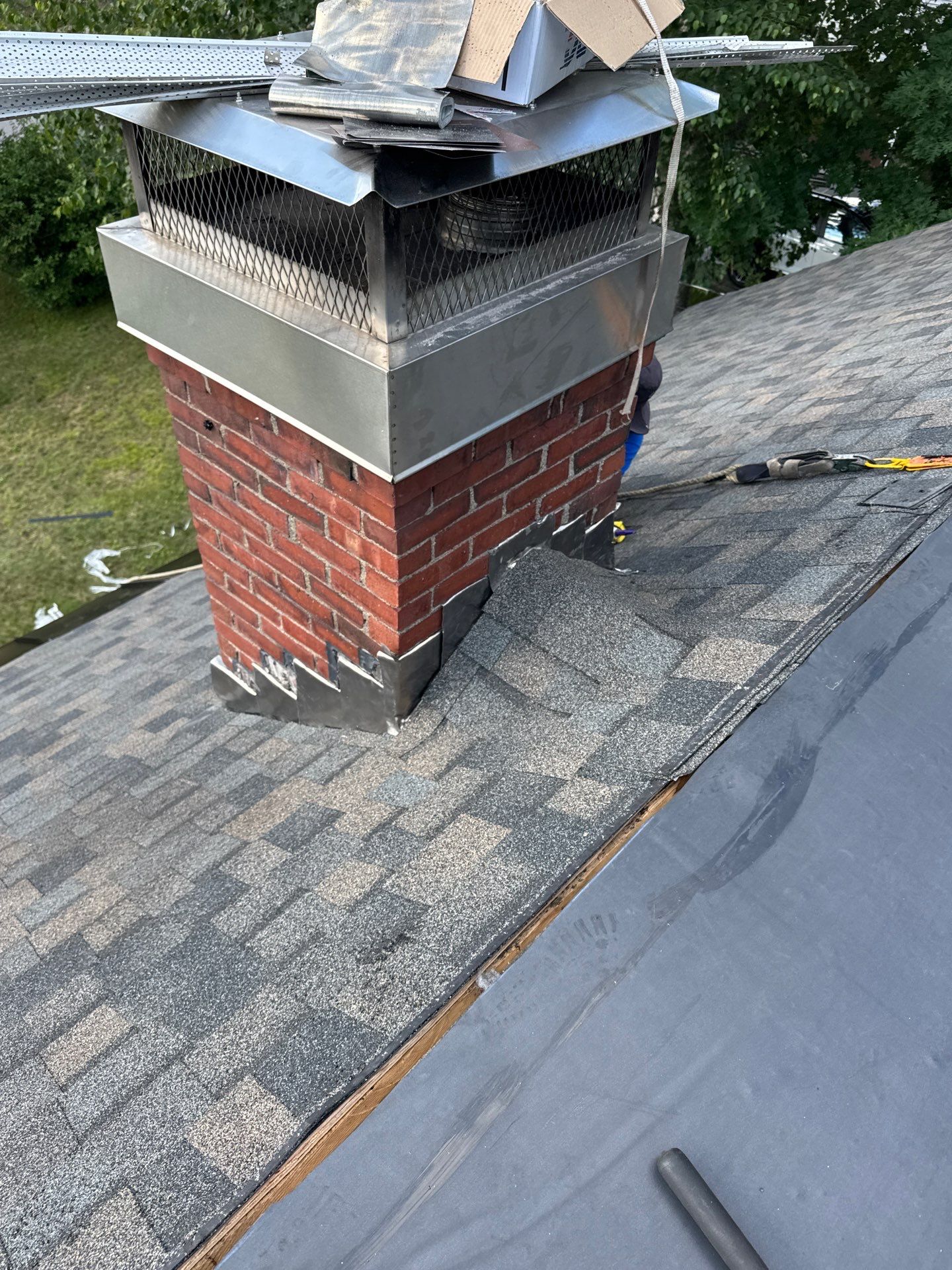 Hybrid Roof Replacement in Pembroke, NH with Owens Corning Peppercorn Shingles, EPDM Rubber Roofing, and Black Metal Ice Belt by Compass exteriors