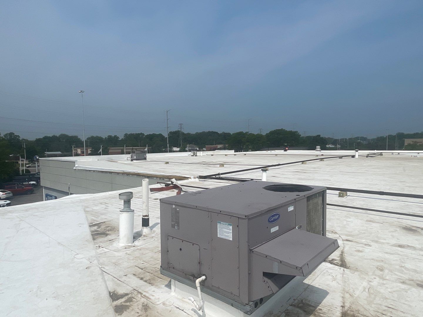 Ford Dealership - Re-Roof by Pink Roofing