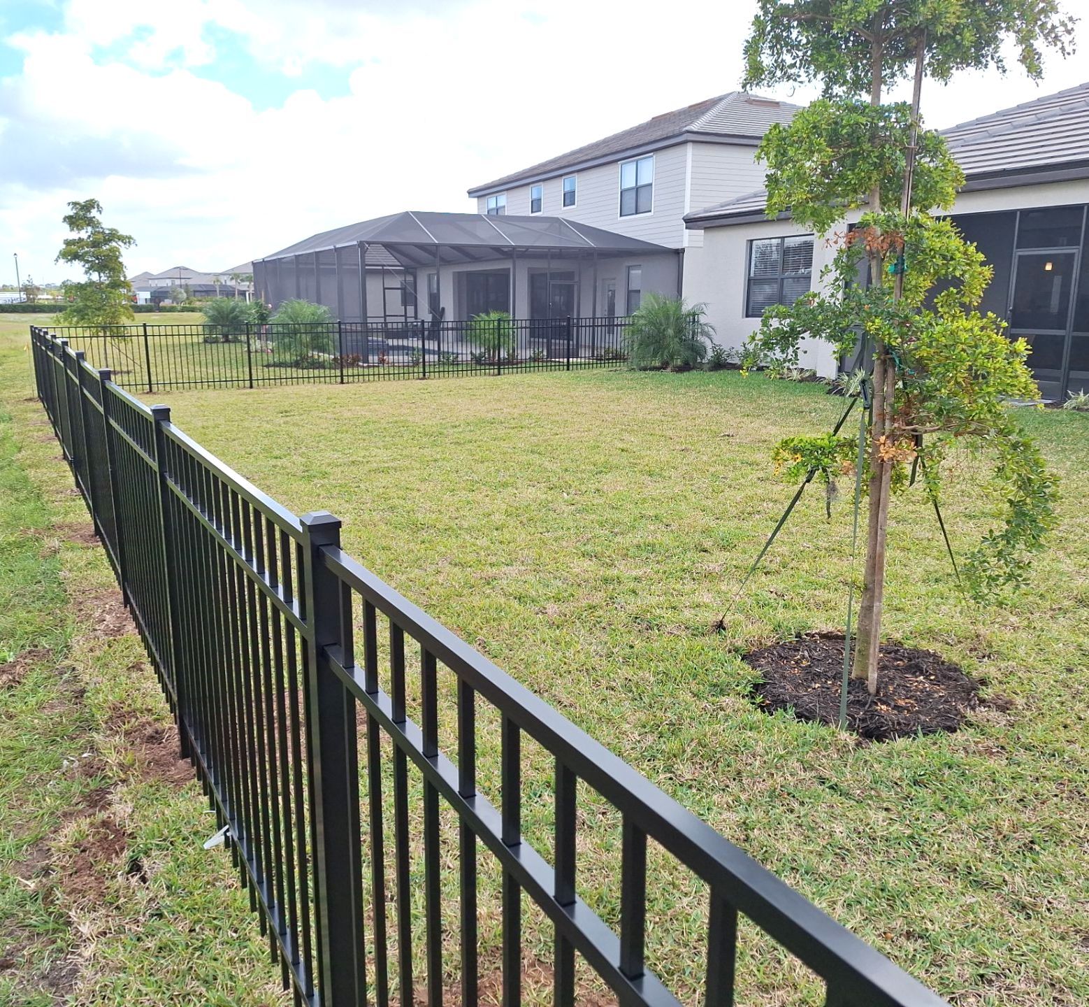 Aluminum Fence Installation using 4ft 3 Rail Black Aluminum Fence by Asap fence and gates, LLC