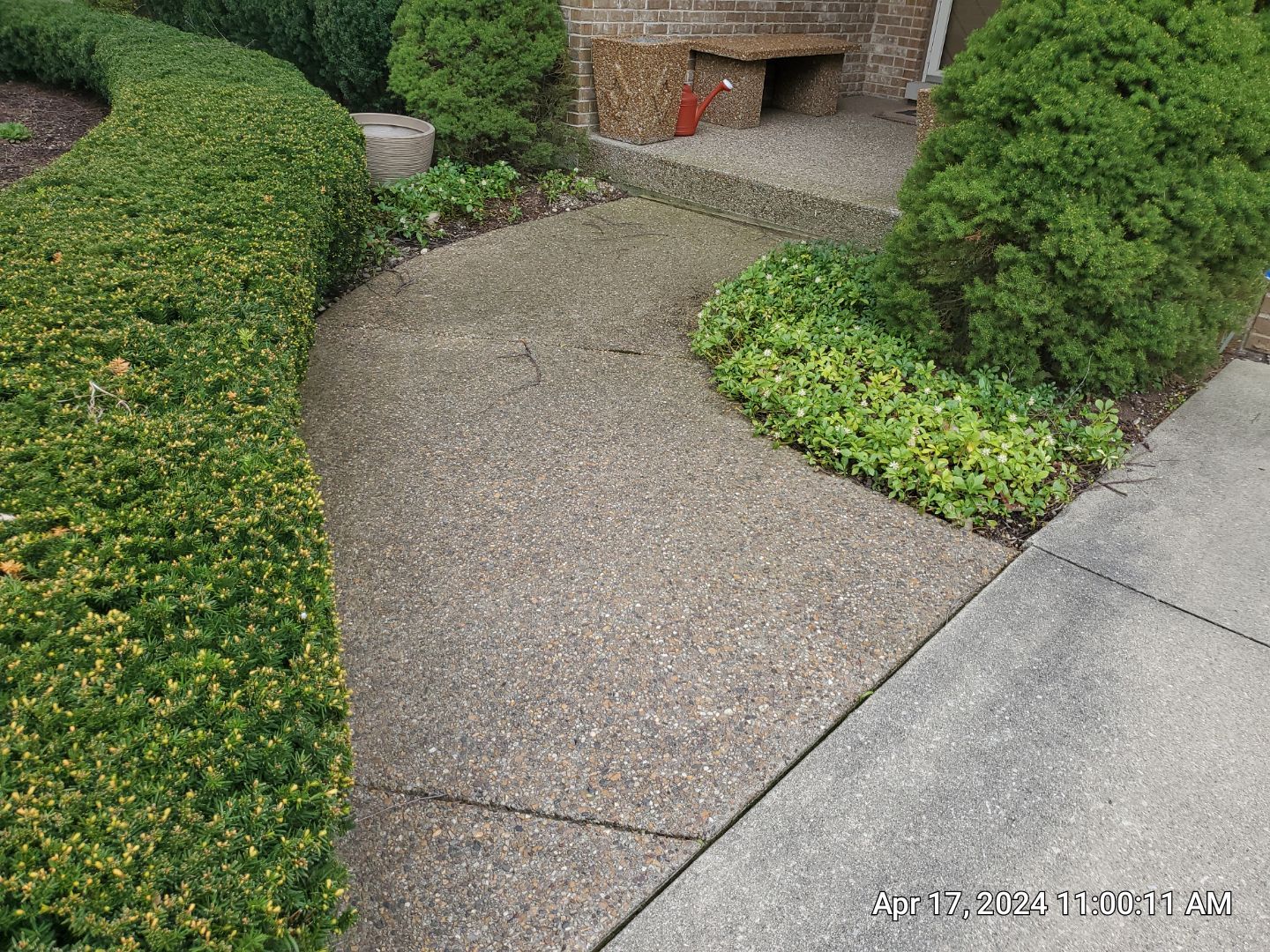 concrete patio and driveway cleaning by Northern Power Washing LLC.