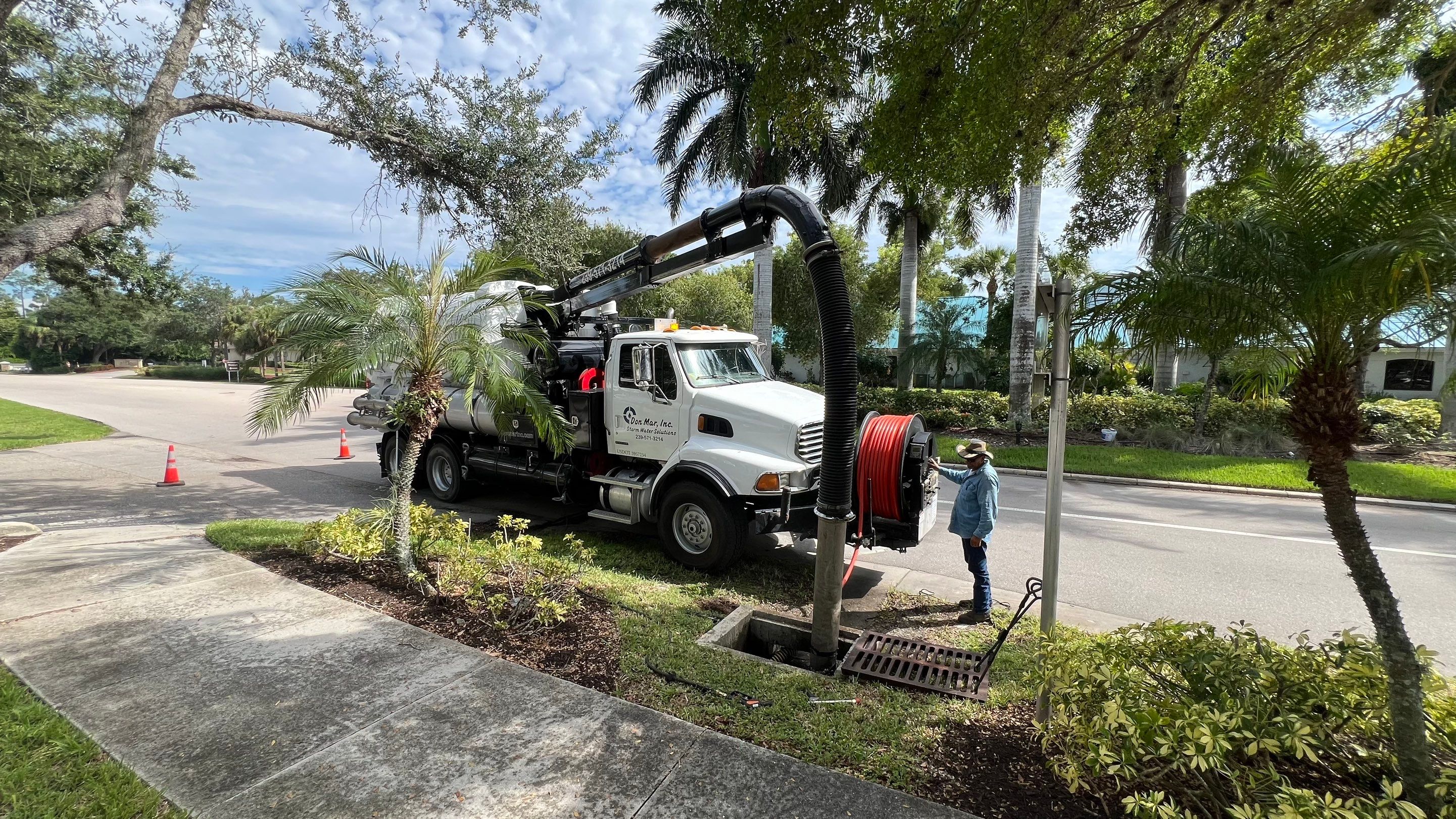 Naples Community Entry Road Stormwater System Cleaning by APS Power & Water
