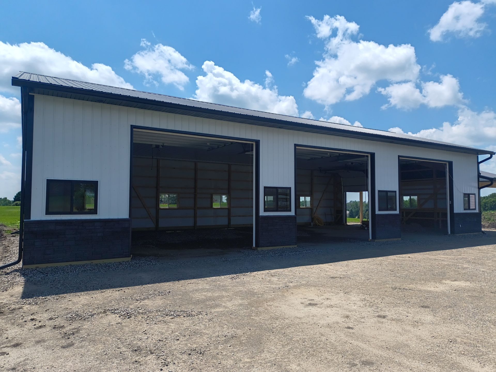 6" Black Seamless Gutters and Downspouts Loretto, MN  by Next Level Seamless Gutters / Exteriors Inc.