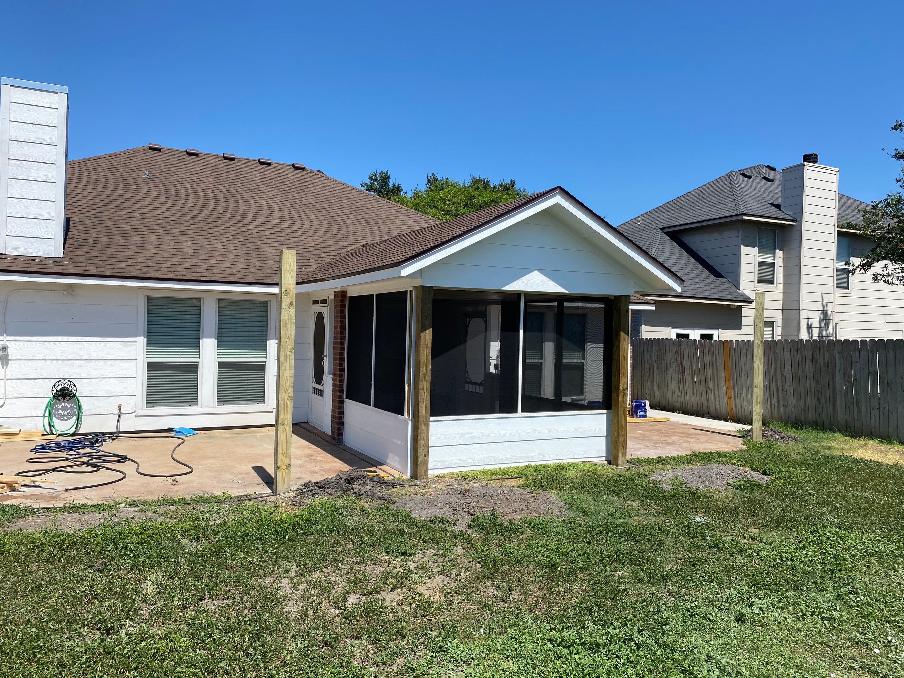 Back Yard Shade by Bayfront Roofing and Construction