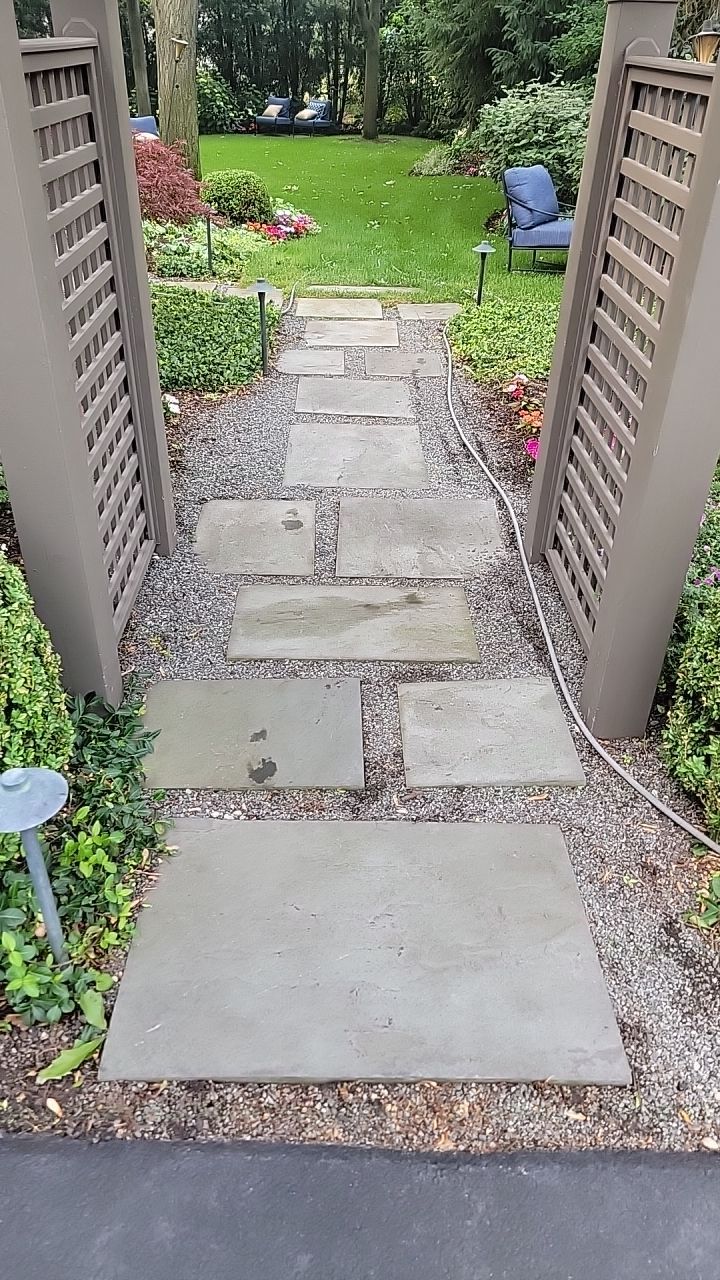 Northbrook, IL stucco home soft wash and stone cleaning by Northern Power Washing LLC.