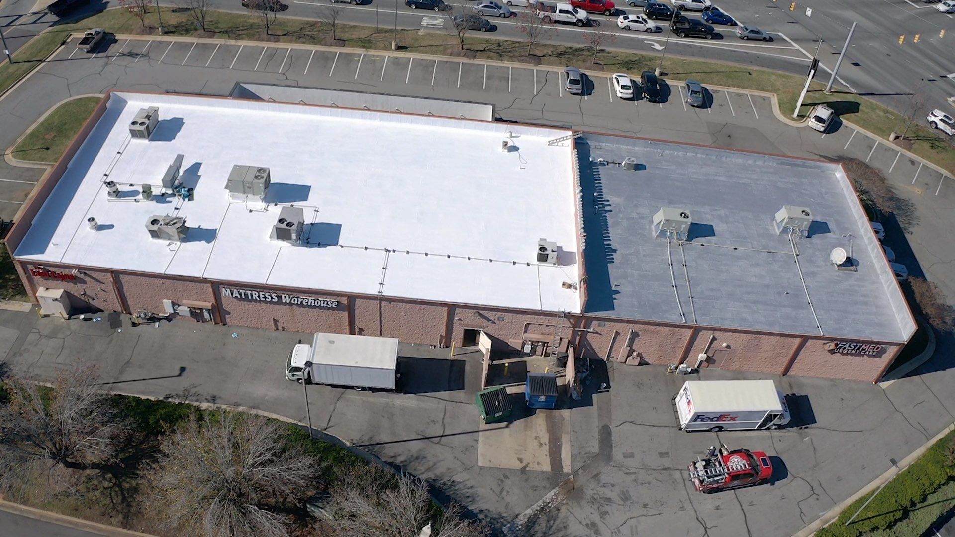 Commercial Coating using Poly Urerthane and Silicone Coating by Just In Time Roofing and Restoration