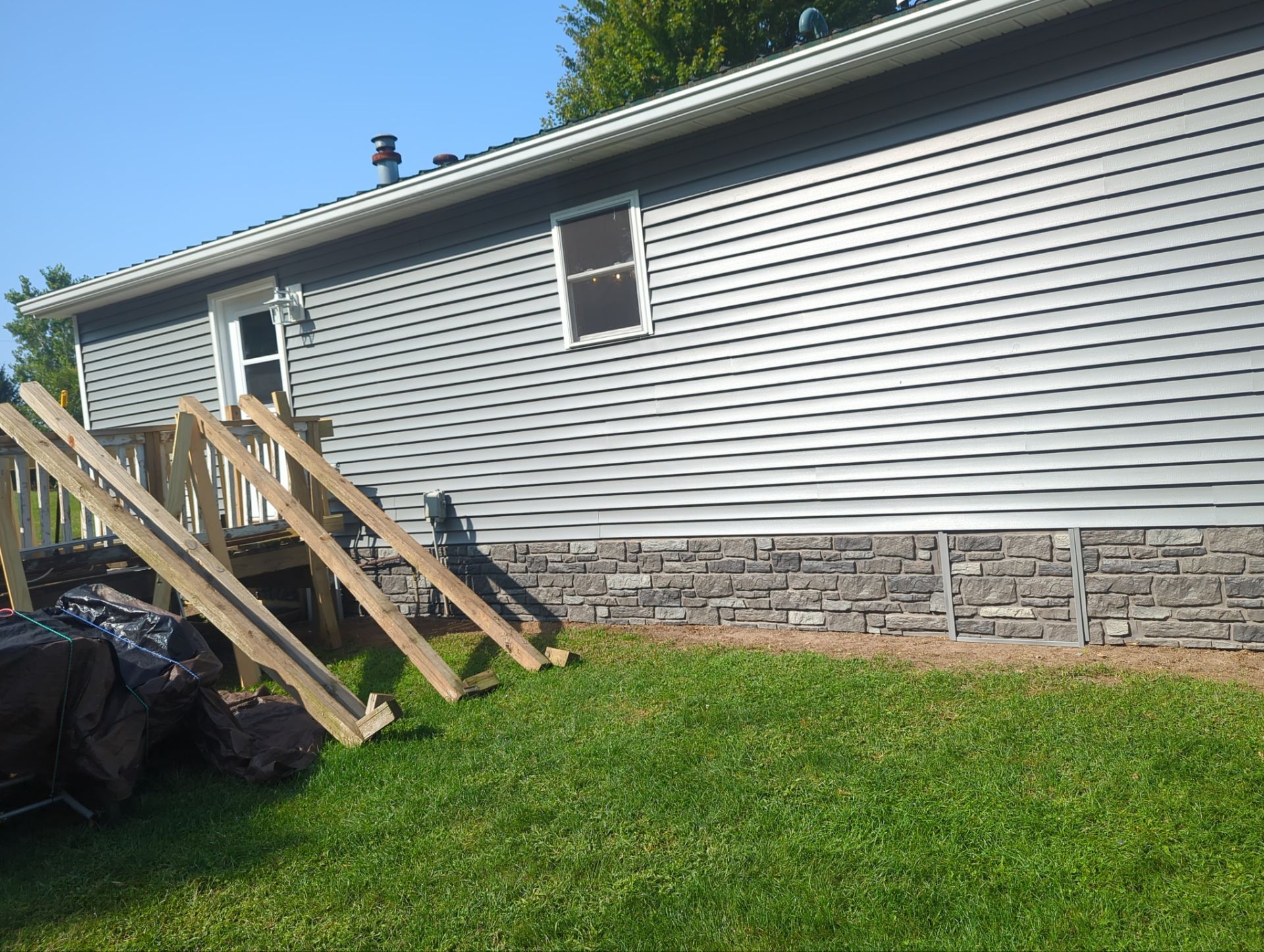 Siding Installation using CertainTeed Monogram Siding and Tando Stone. by Energy Plus Home Improvements
