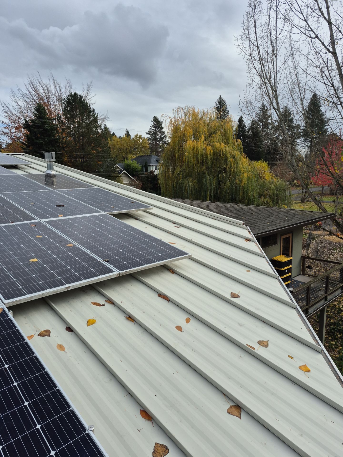 New Metal Roof and replace solar panels by Hawthorne General Construction