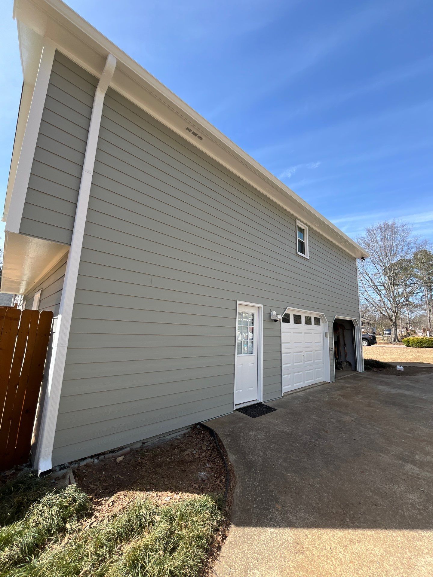 Acworth, GA James Hardie Board and Batten Siding Installation, Porch Renovation, Exterior Painting, and Window Replacement by Nelson Exteriors 