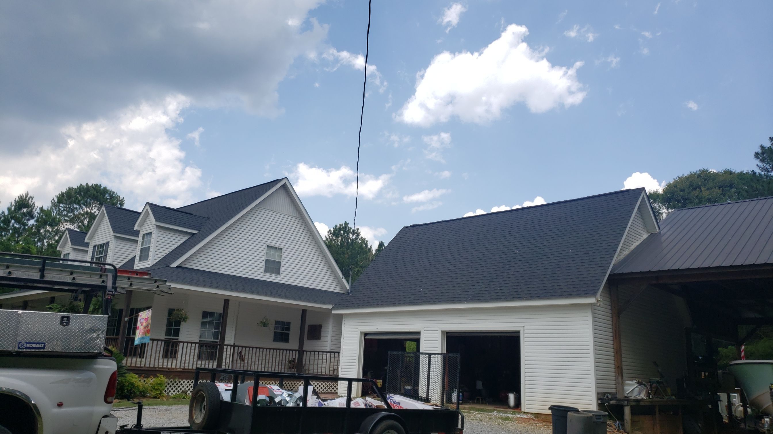 Residential Roofing Installation using Roof Replacement by American Roofing & Construction LLC
