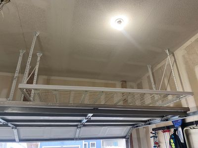 John B. adds ceiling rack to garage!