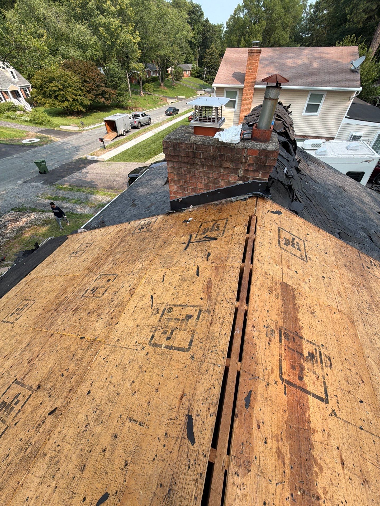 Asphalt Shingle Roof Replacement and Gutter Installation in Richmond by Cade Construction
