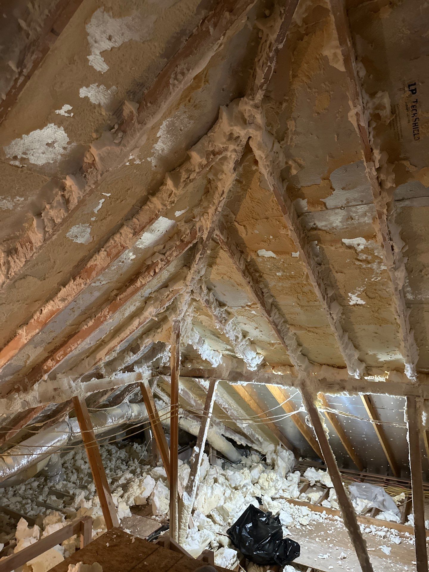 Spray foam insulation removal & re spray by Apex Insulation Solutions
