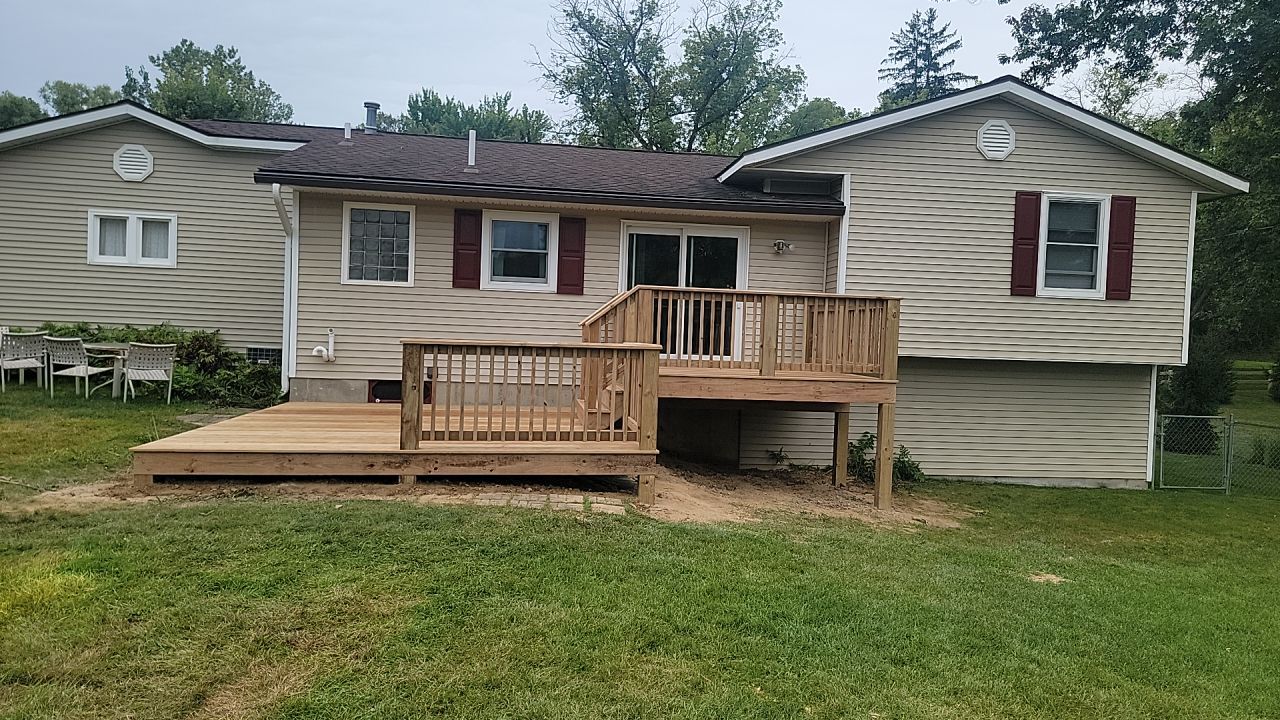 Deck Installation using Treated Lumber by Avalon Roofing and Exteriors