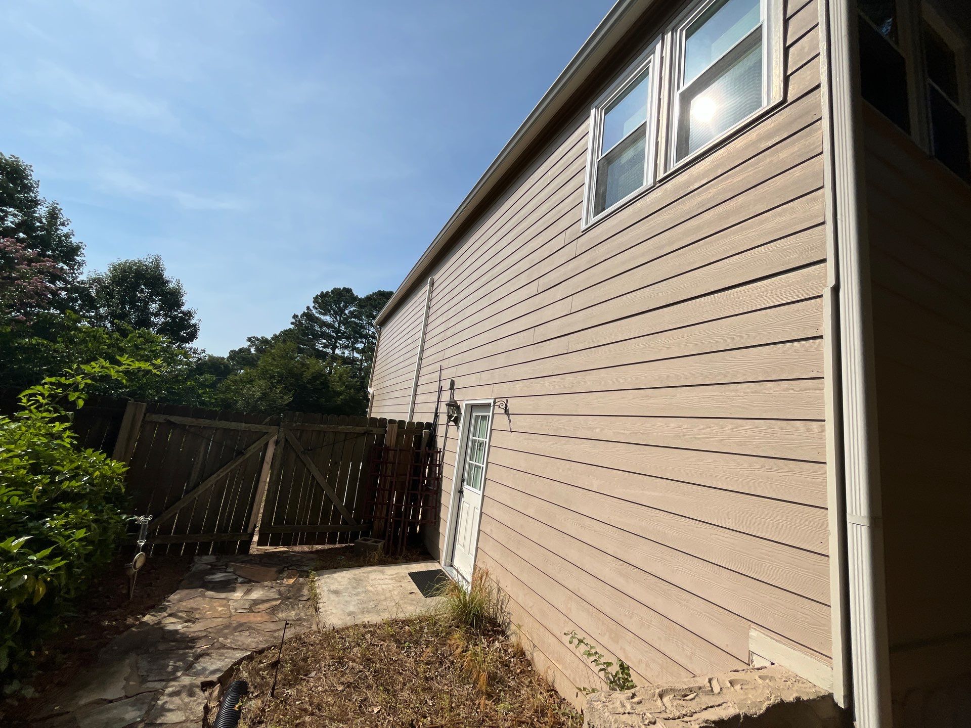 Rotted Wood Replacement, Deck Stain, and Exterior Paint Project in Kennesaw, GA by Nelson Exteriors 