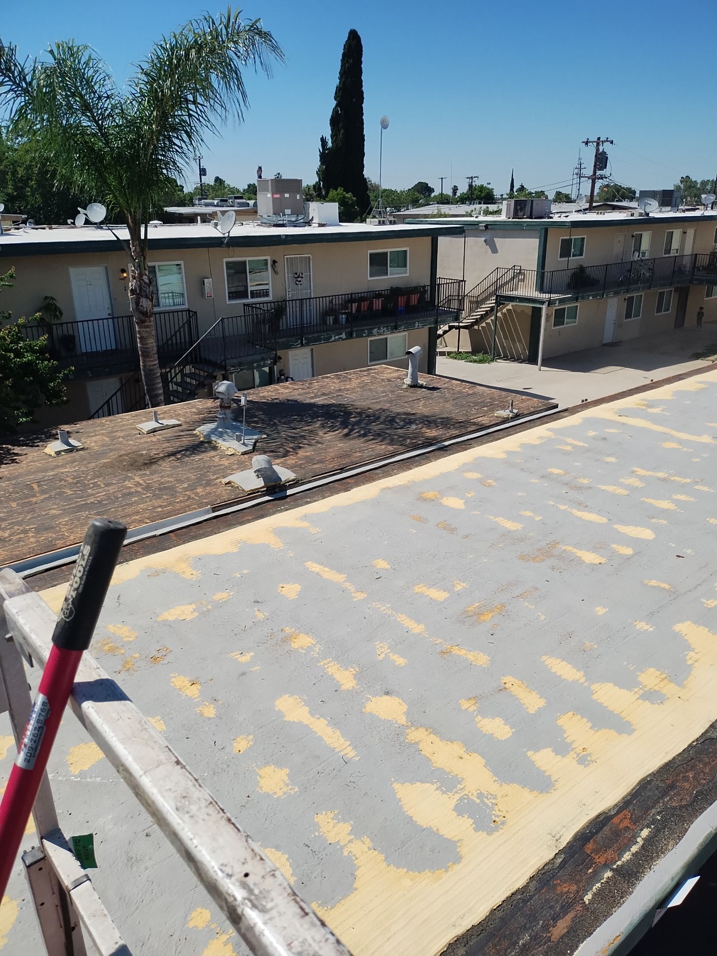 Foam Refurbish using General Coatings acrylic coatings and spray foam by Straight Edge Roofing Inc